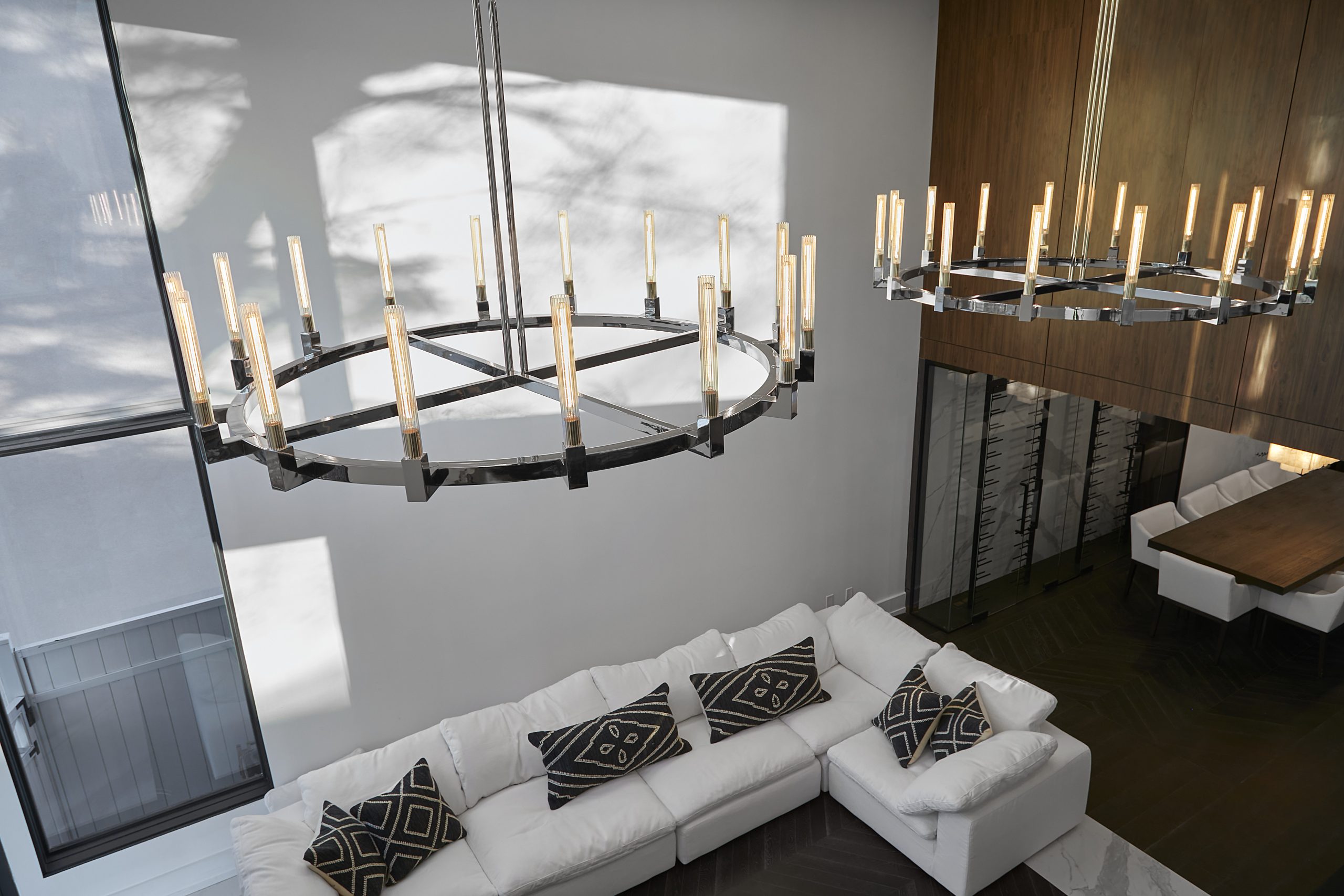 Bright living area beside full-height windows
