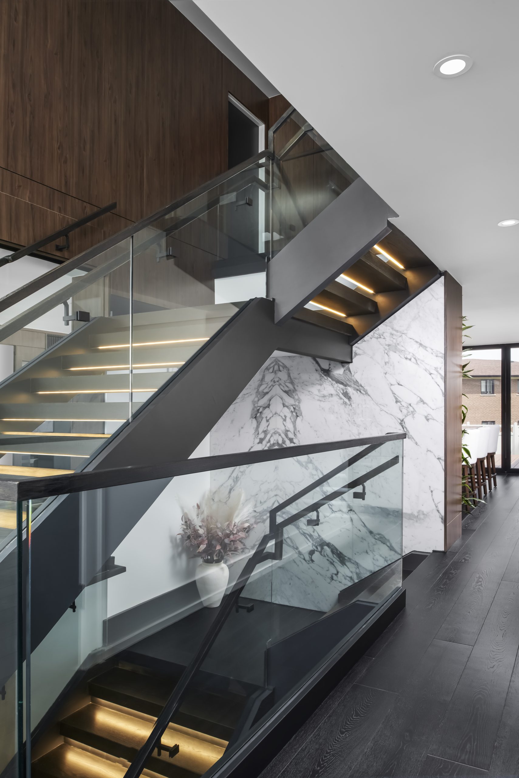 Glass staircase and interior garden at Modern Astoria