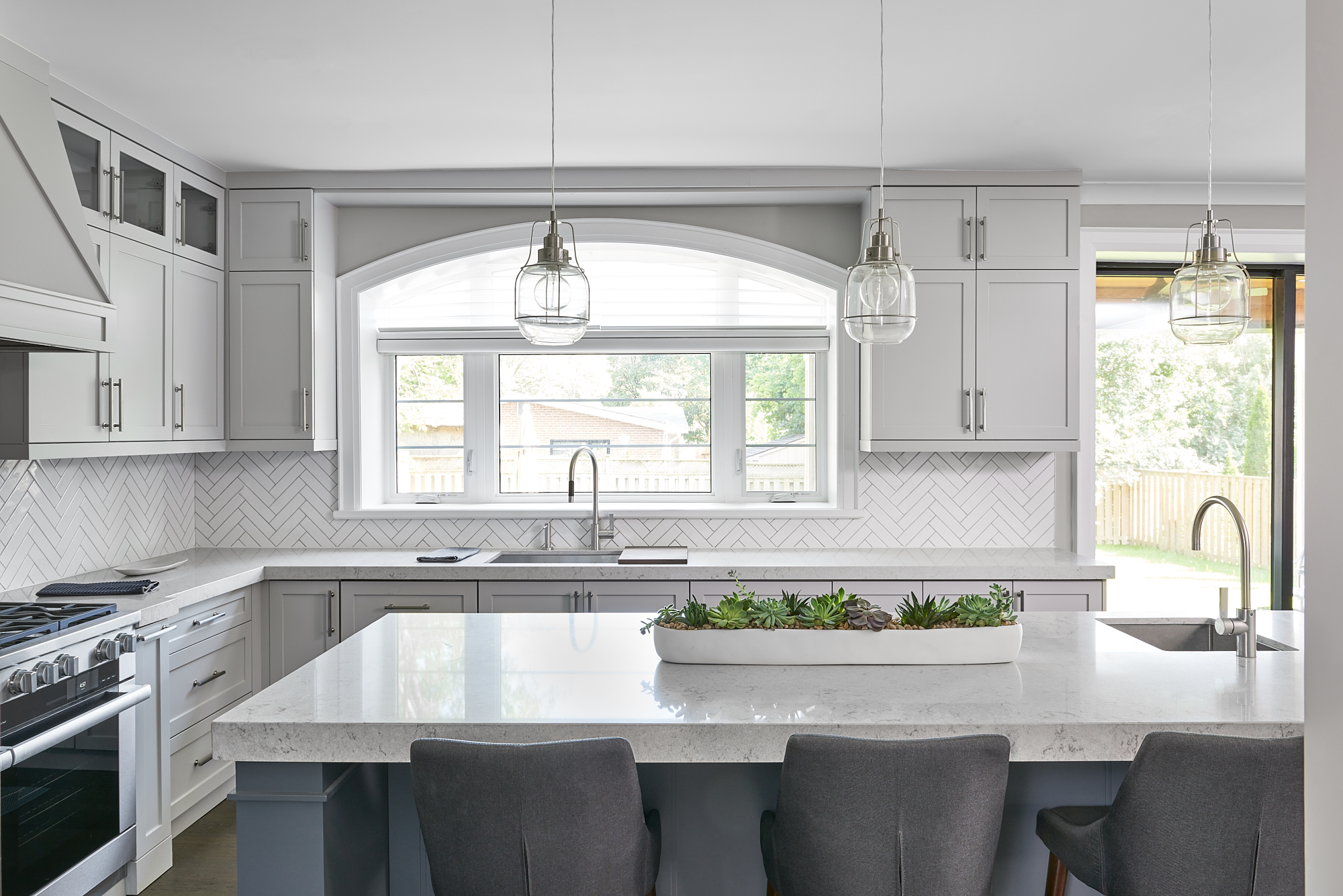 English Cottage kitchen with a marble island
