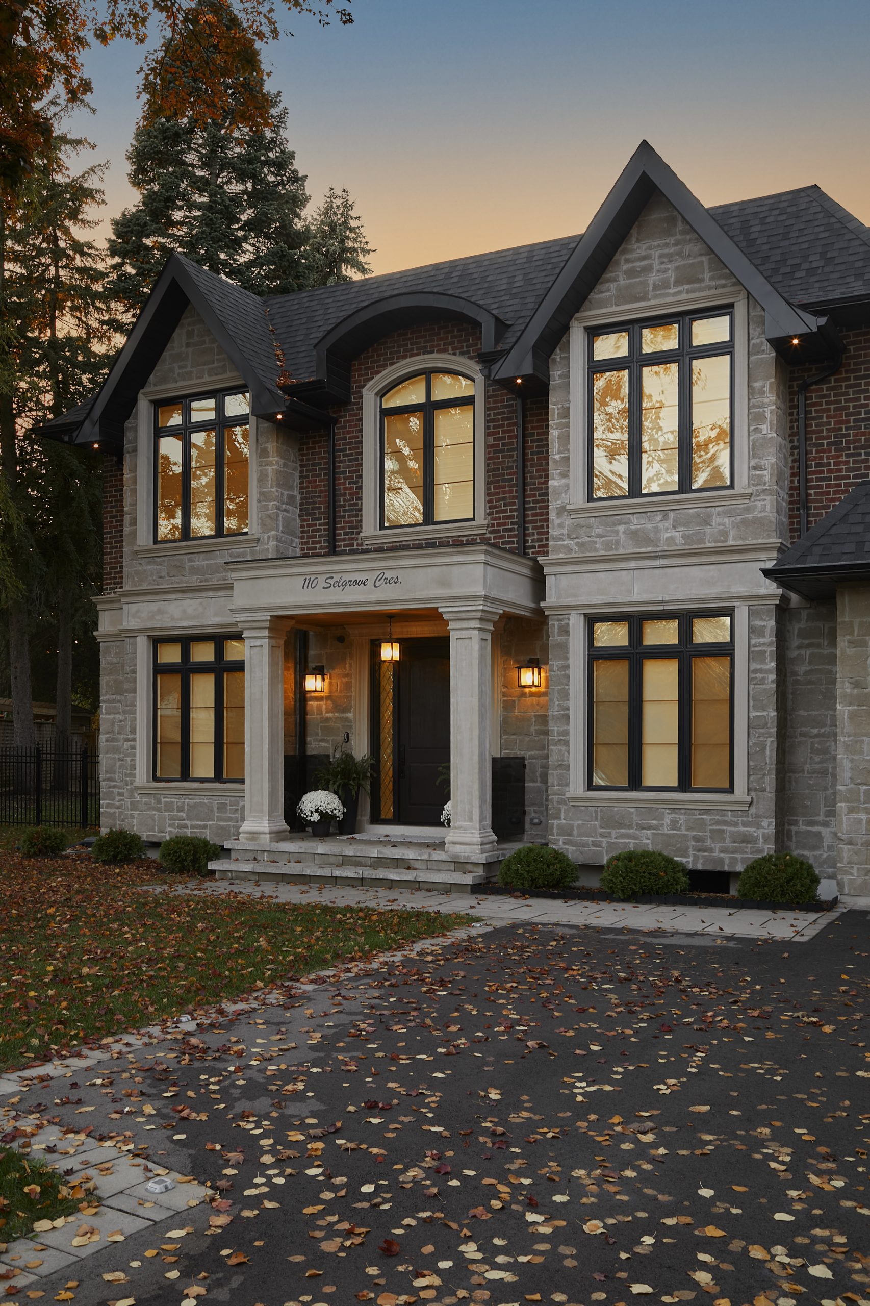 European Manor entrance and curved upper roofline