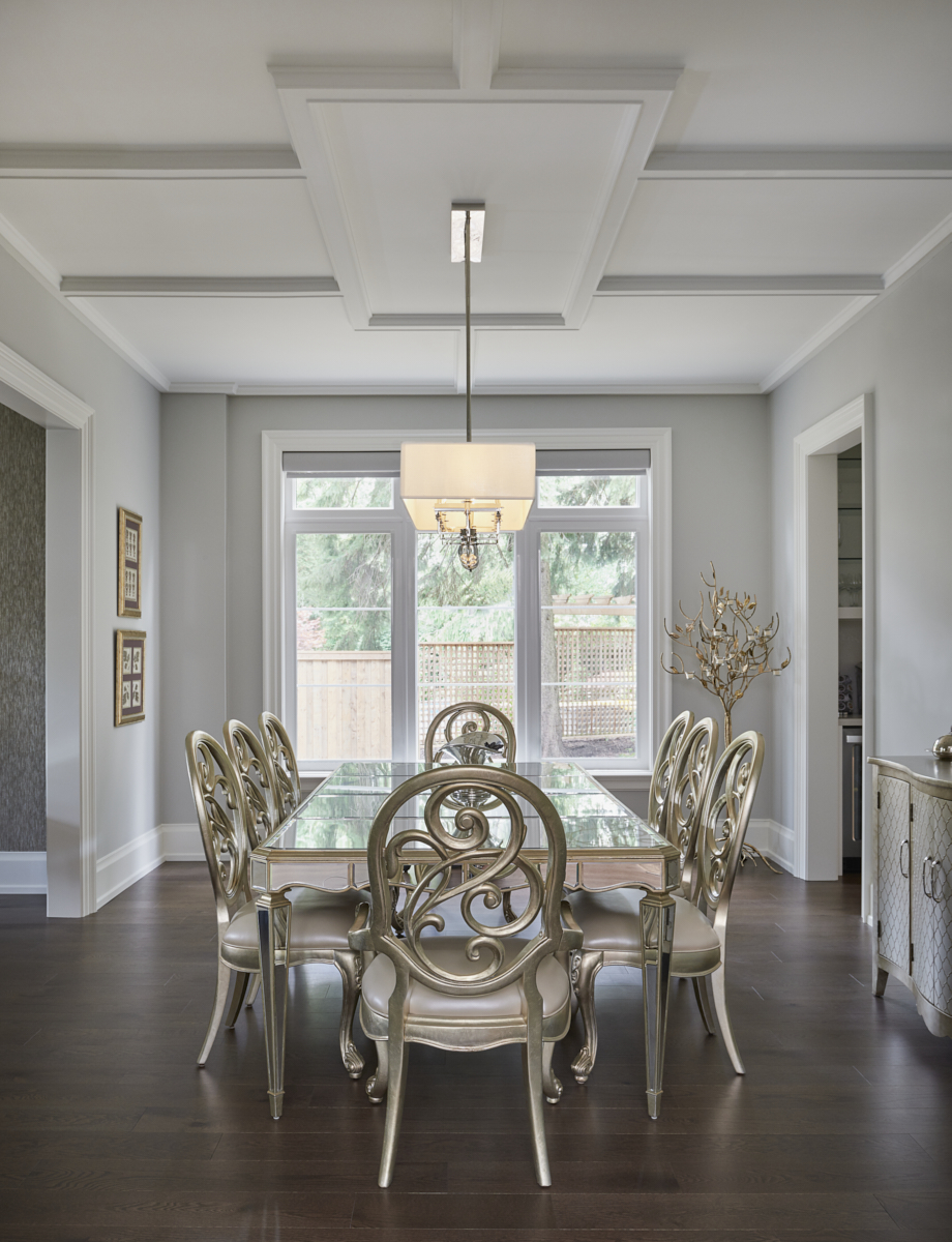 Bright dining room with sculptural pendant lighting