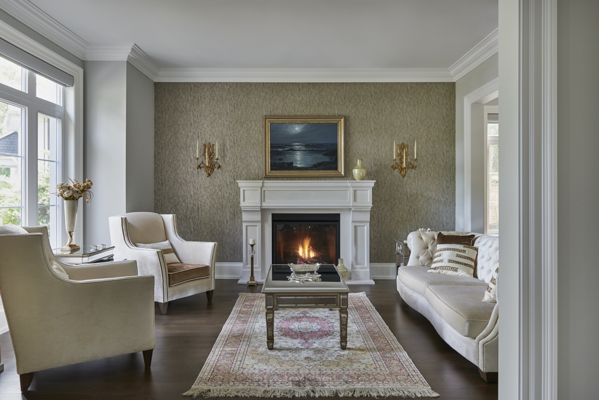 European Manor living room with fireplace and garden windows