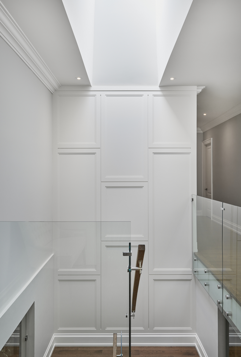 Marble shower framed by a pointed arch