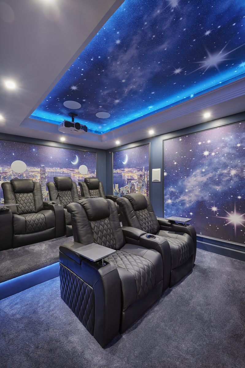 Home cinema with blue ceiling lights