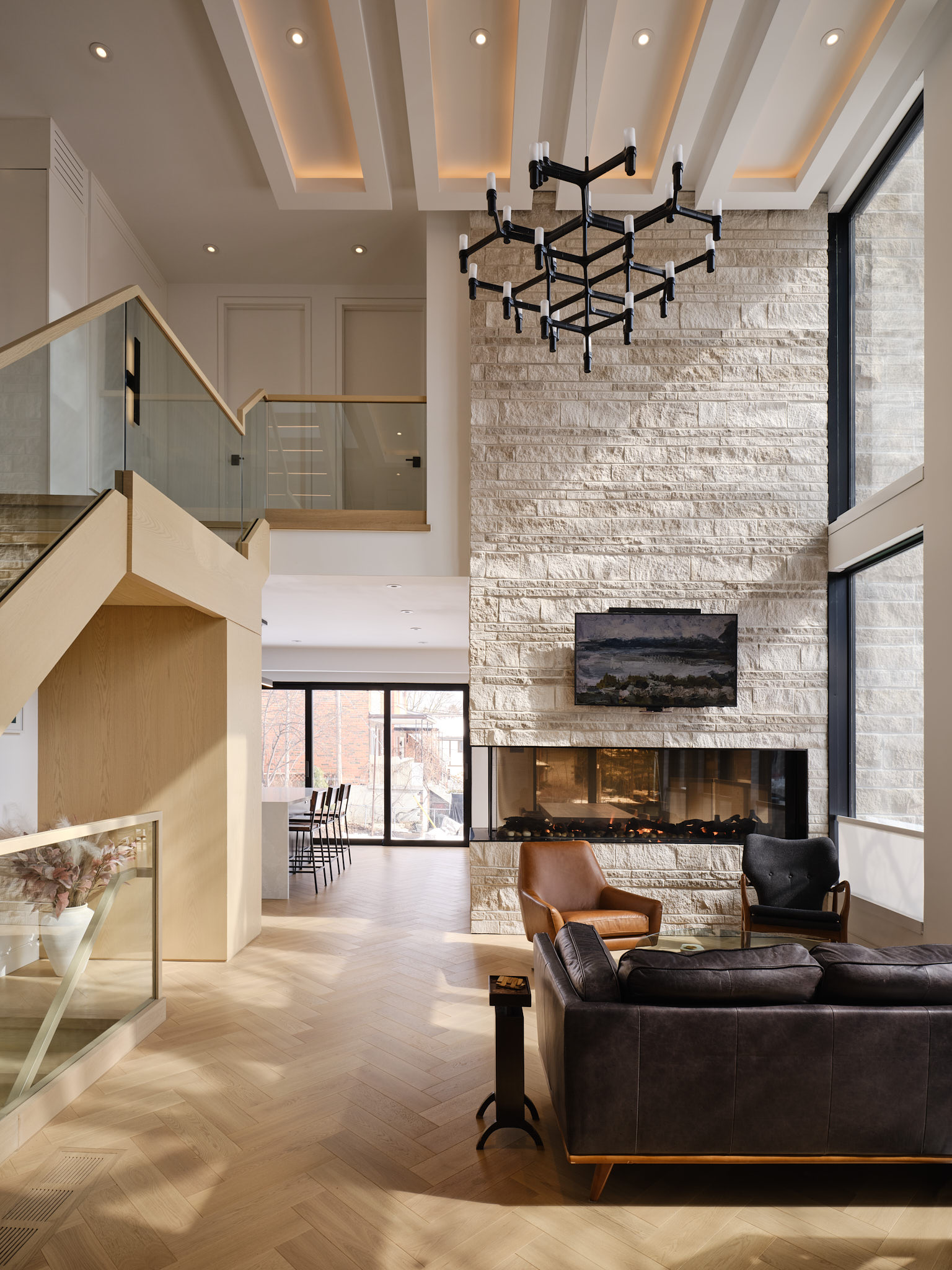 Stone fireplace and open living room