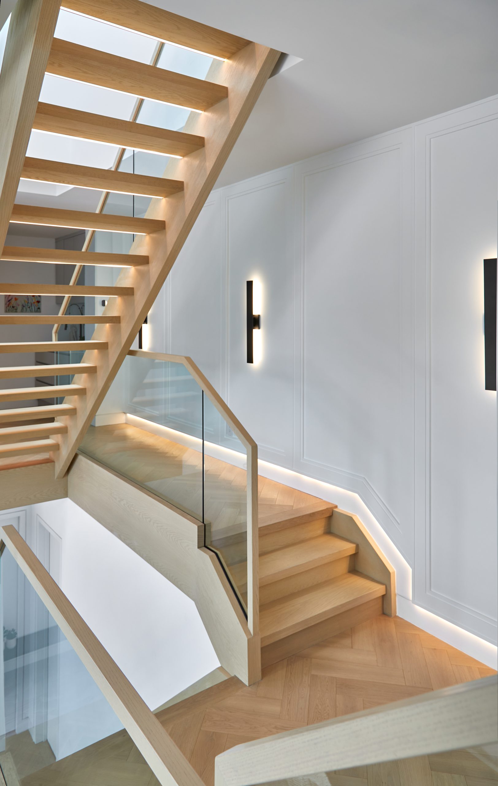 Open-riser stair beside the kitchen