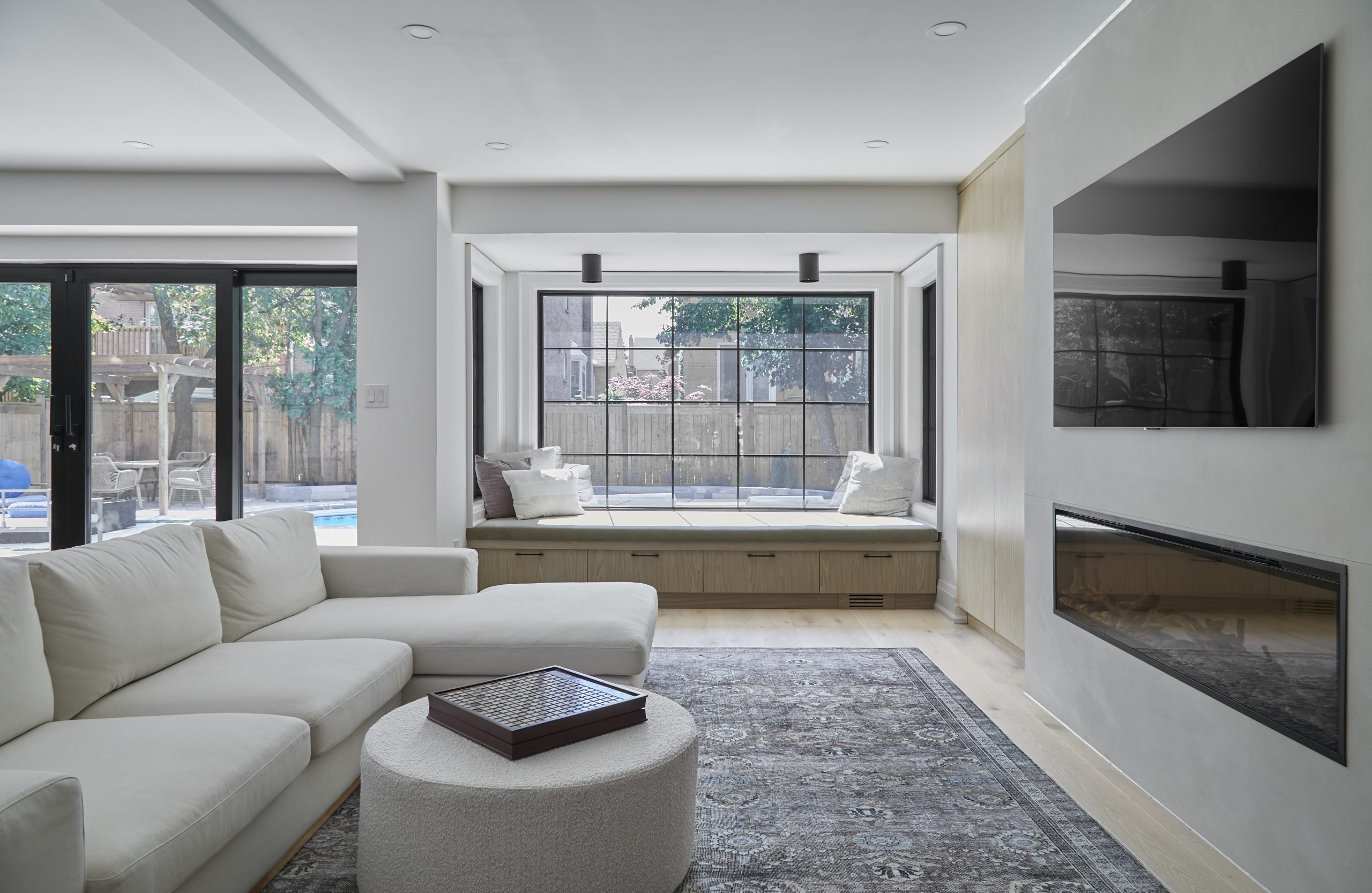 Family room with garden-facing windows