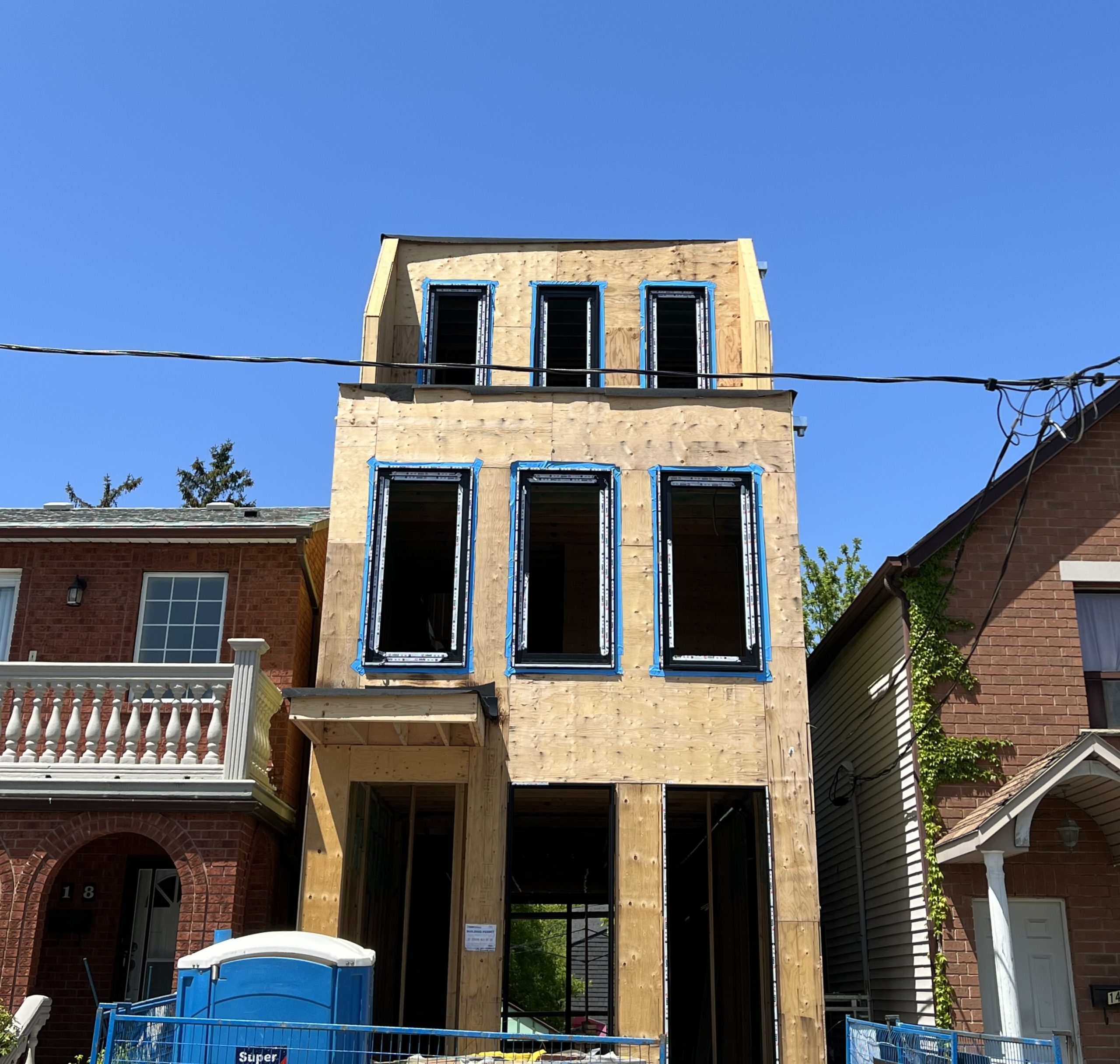 Contemporary Brownstone under construction from the front