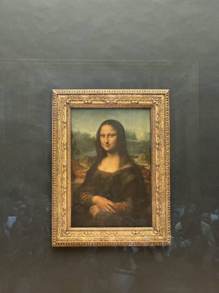 The Mona Lisa displayed in its gilded frame