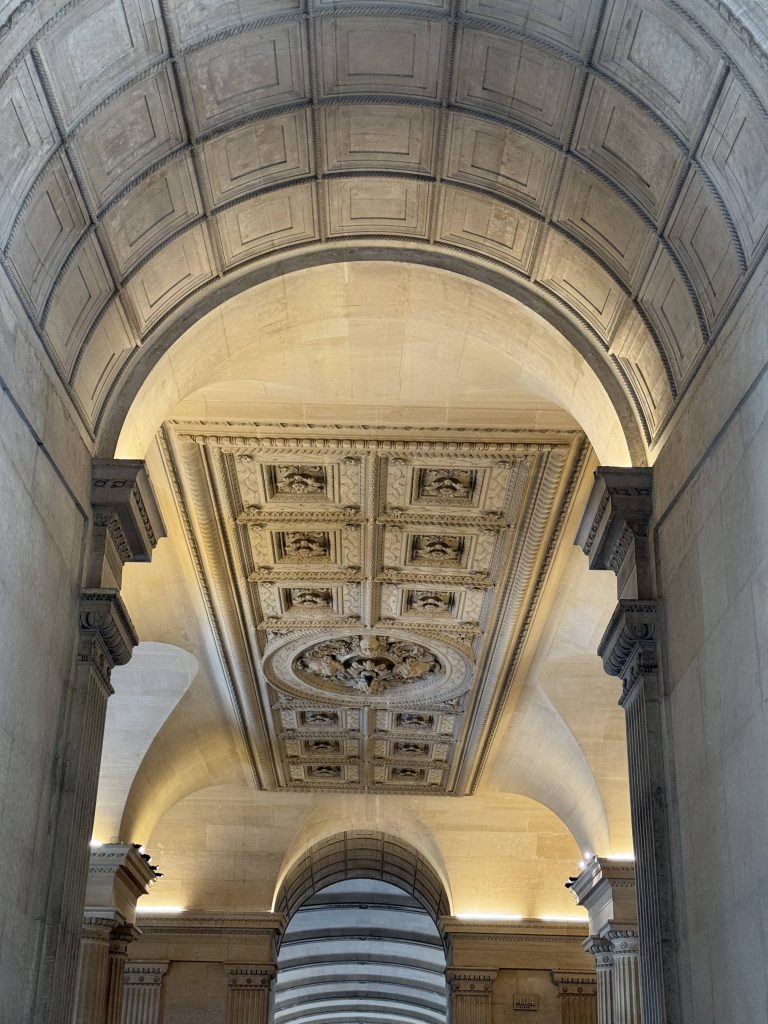 High arched ceiling with painted and gilded panels