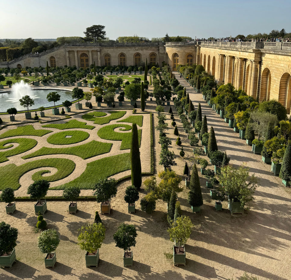Formal terraces with geometric planting and fountains