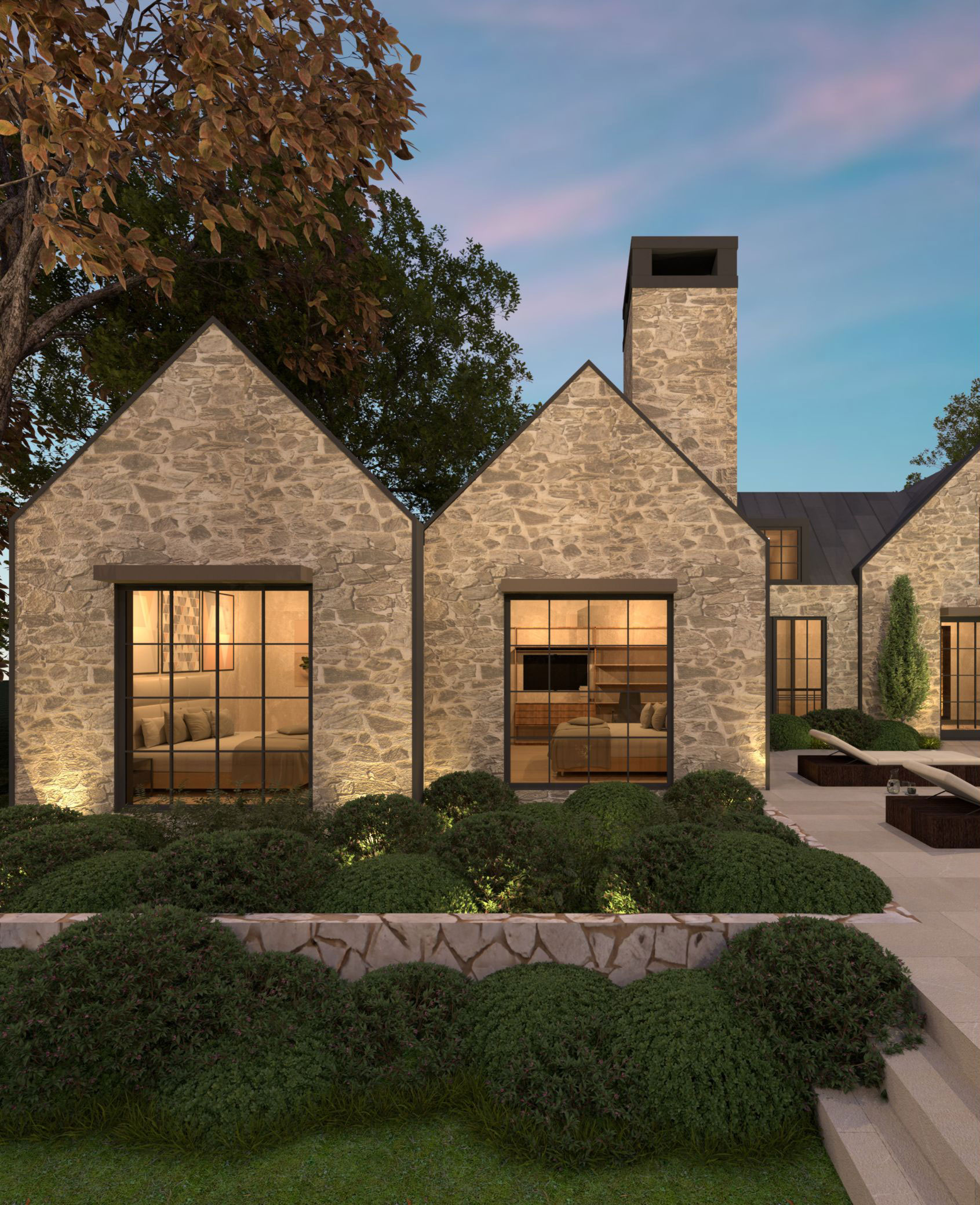 Stone gables and chimney beside planted garden beds