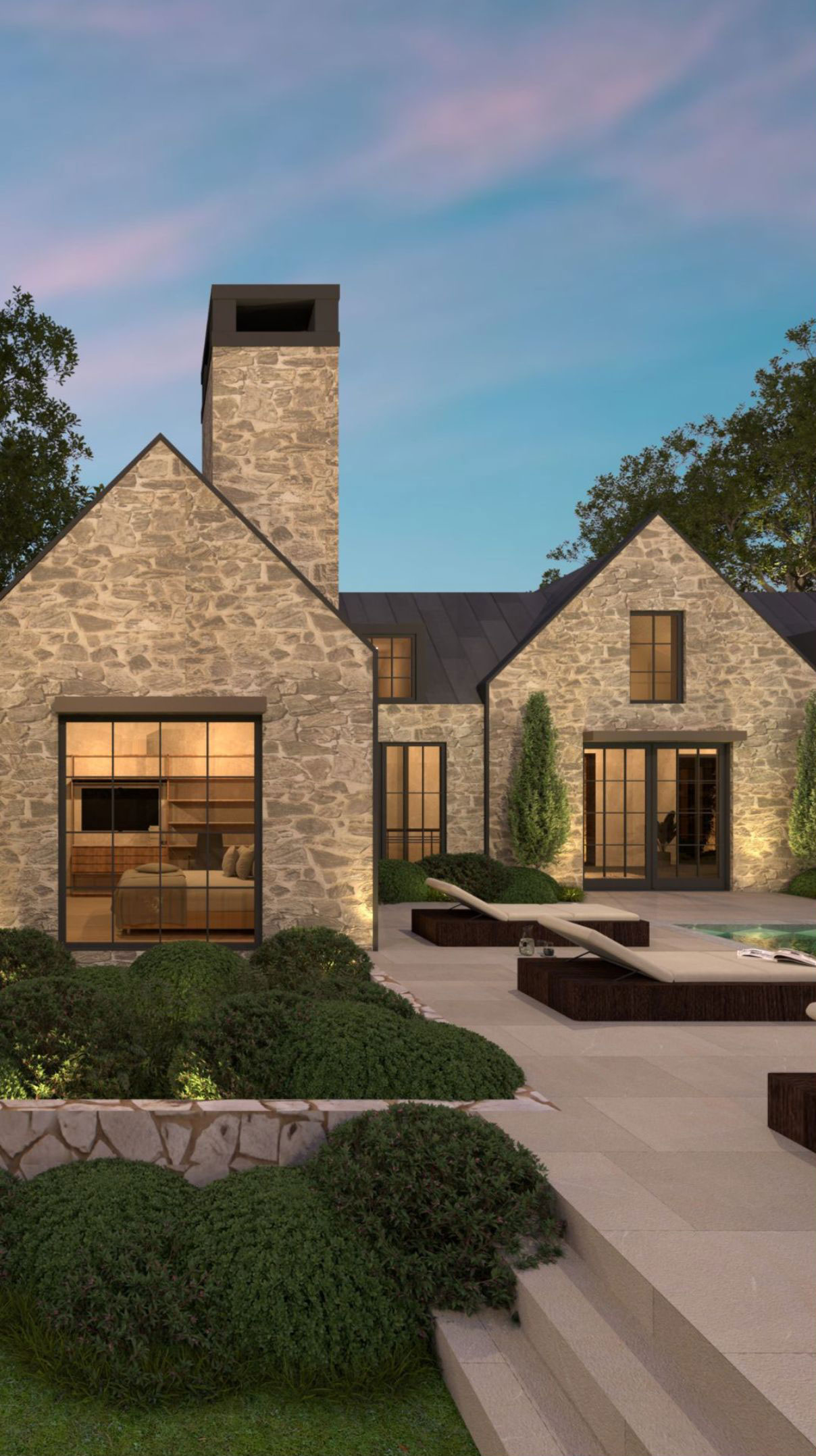Textured stone gables and chimney beside a garden