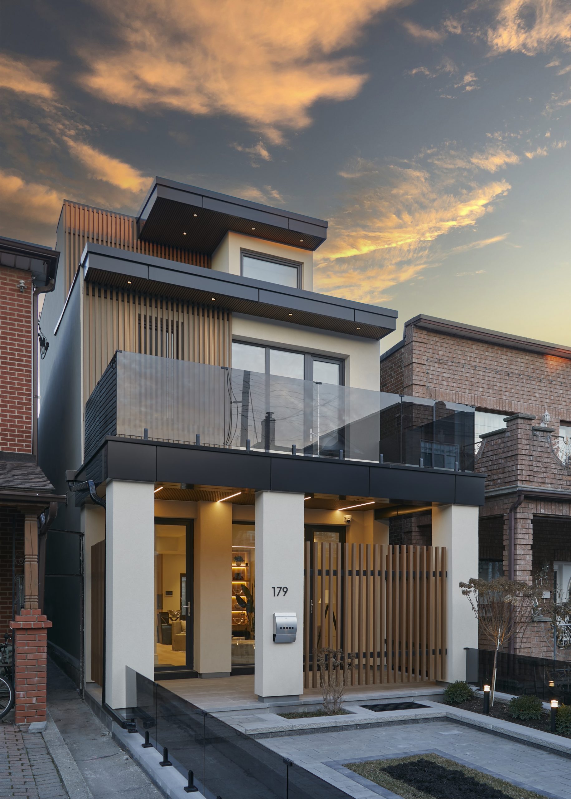Tall rear facade of the completed modern Queen West residence