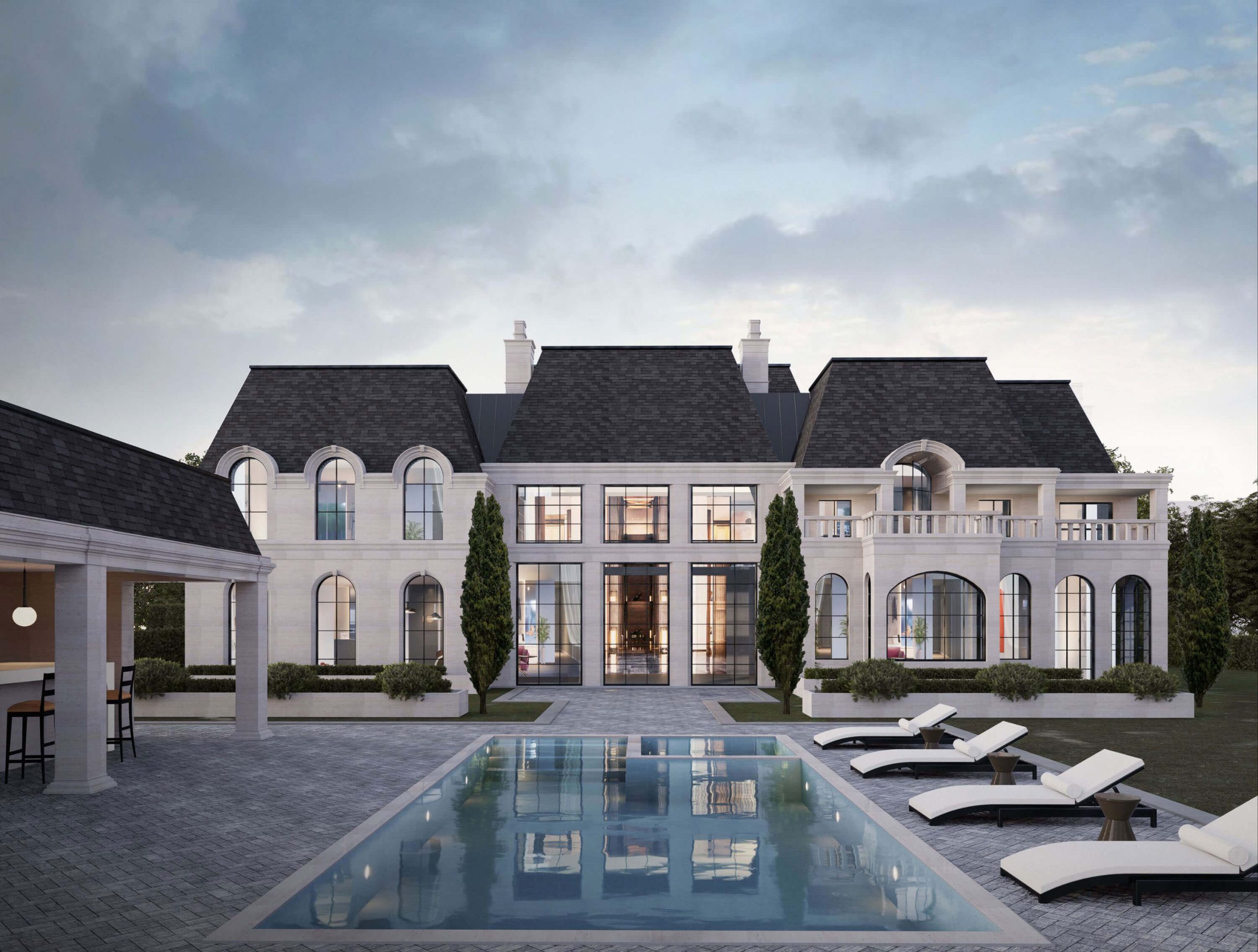 French Estate Home illuminated at dusk