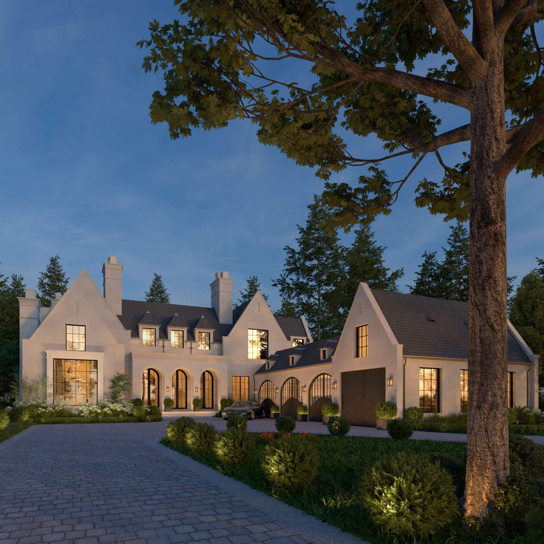 Transitional Country Home framed by mature trees at dusk