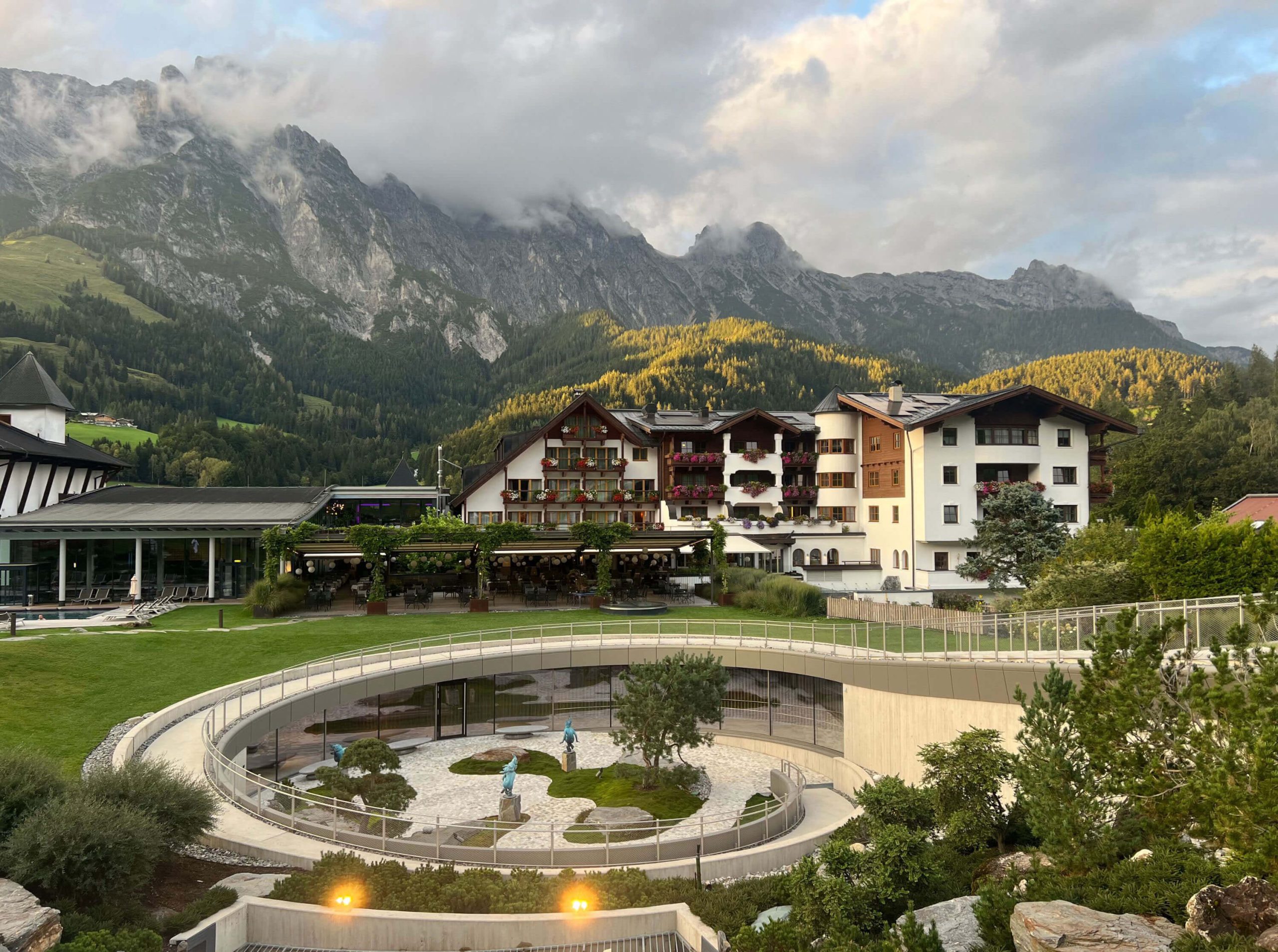 Mountain village and landscaped circular water garden