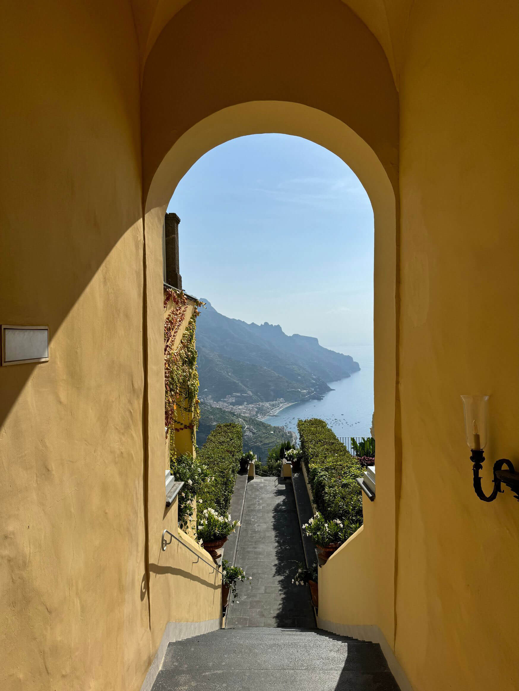 Arched passage overlooking the coast at Belmond Caruso