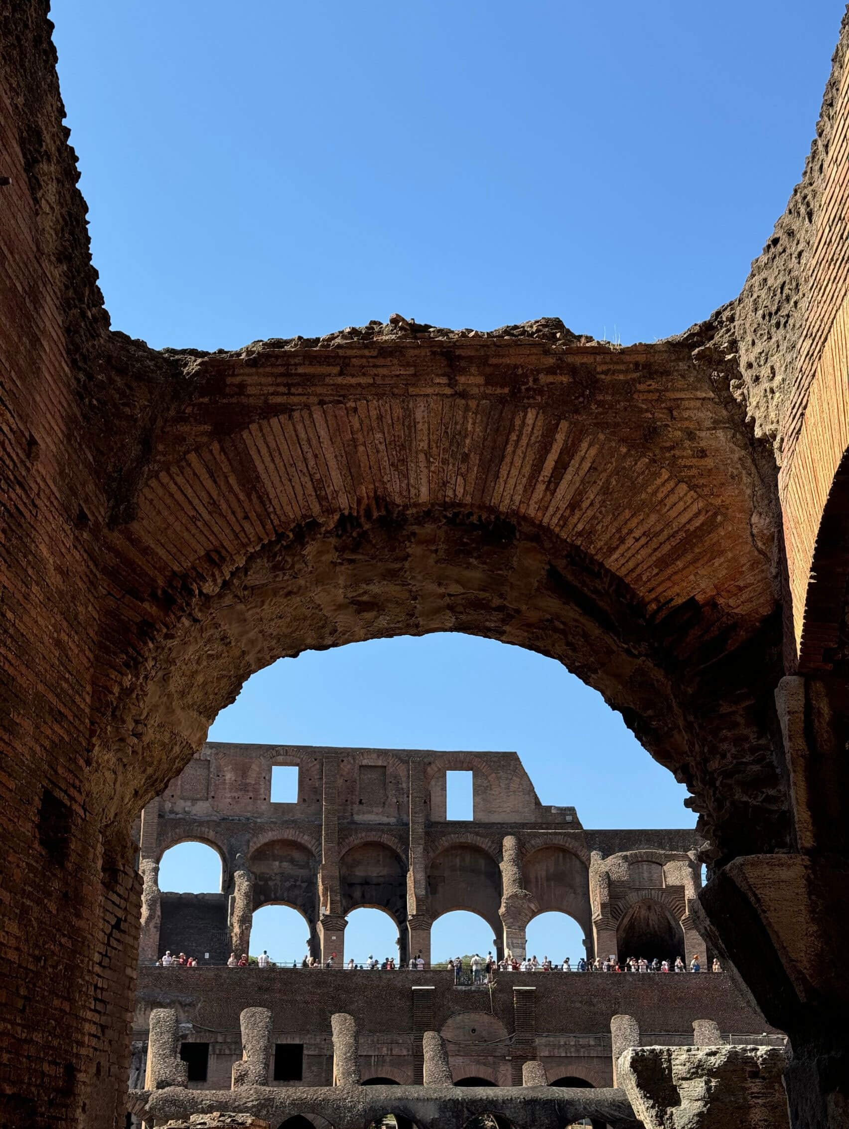 Brick arch framing the amphitheatre interior
