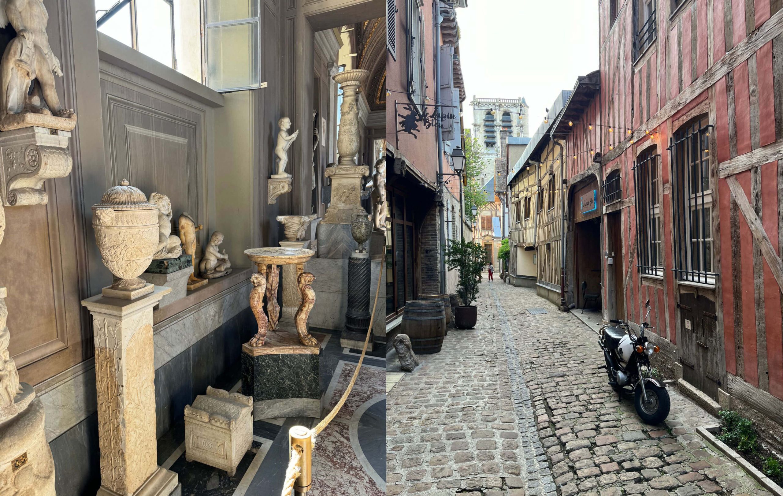 Classical sculpture display and a narrow cobbled street