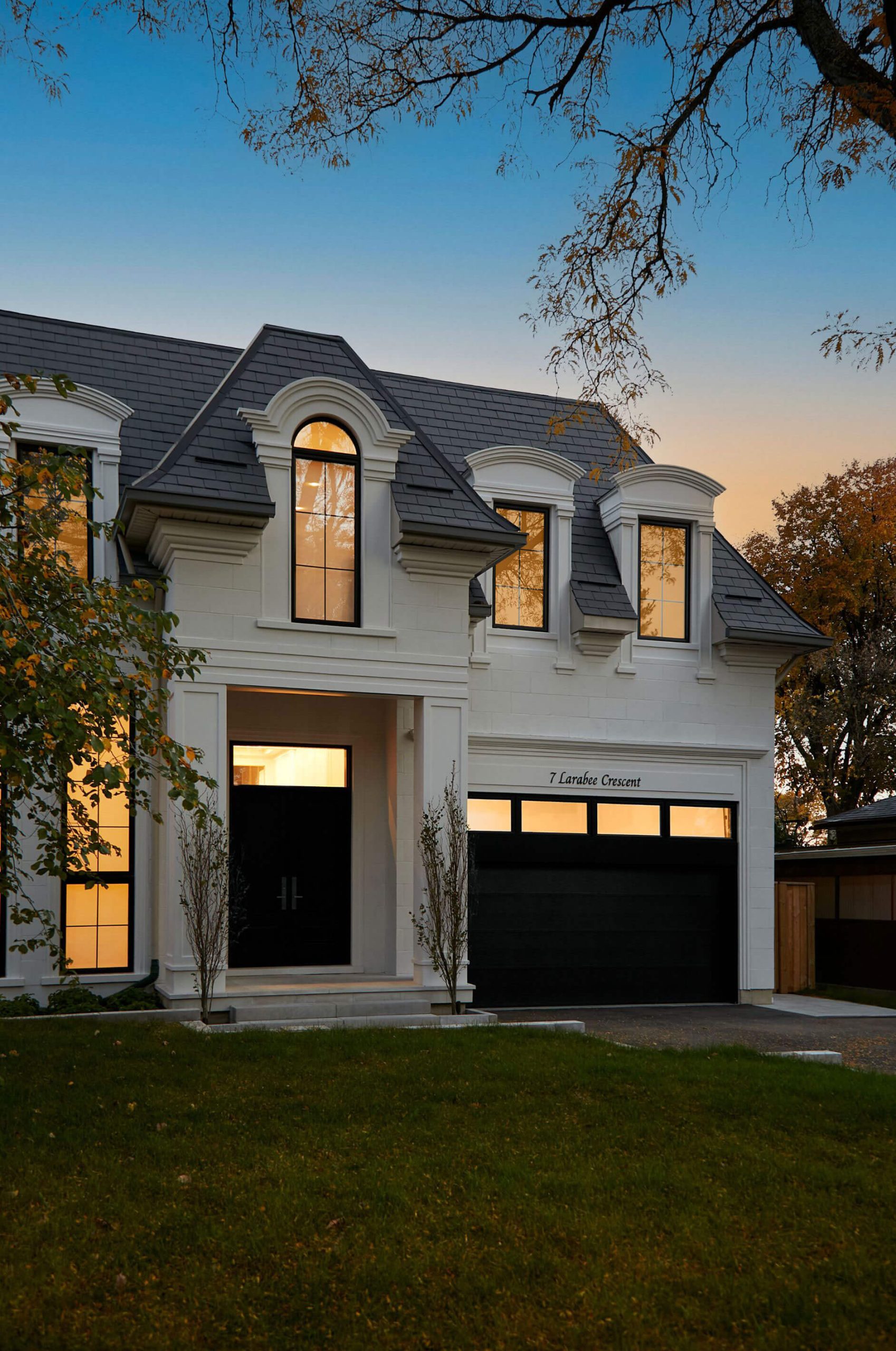 Tall Chateau Donalda windows, archway and limestone dormers