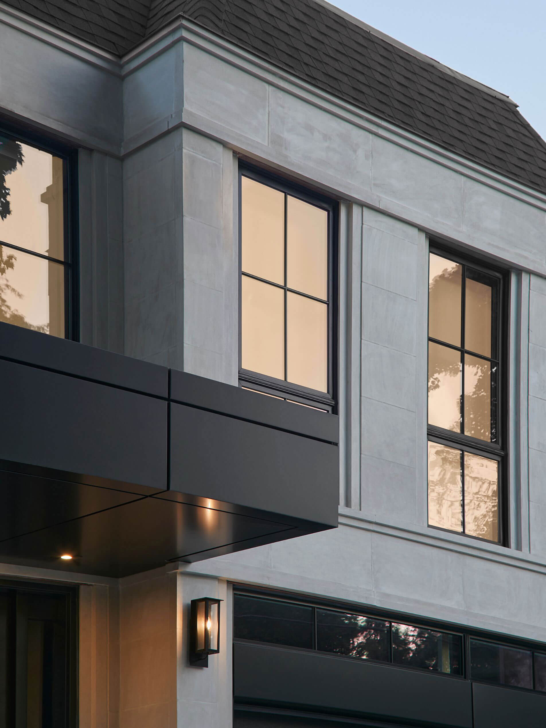 Stepped window trim and limestone details at the chateau entrance