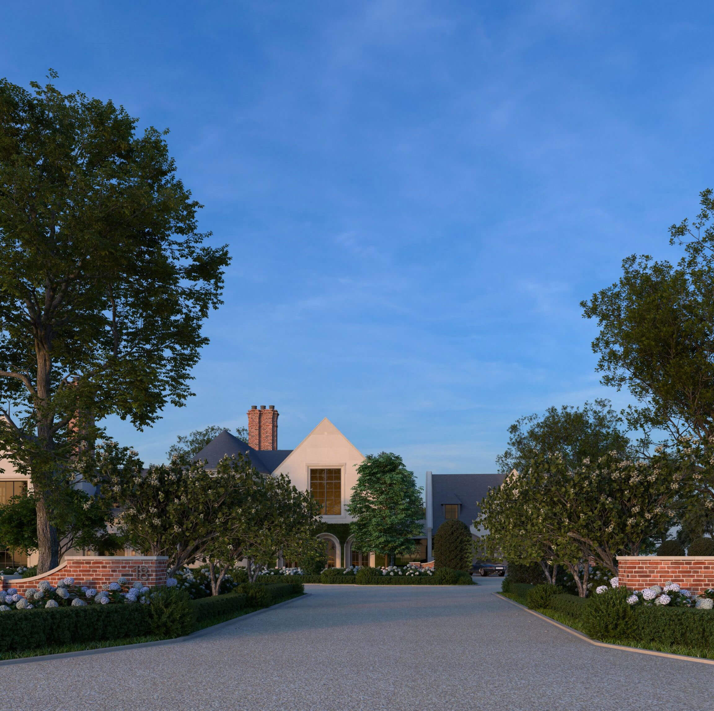 Stone entry court and oversized double doors at Bay Shore Manor