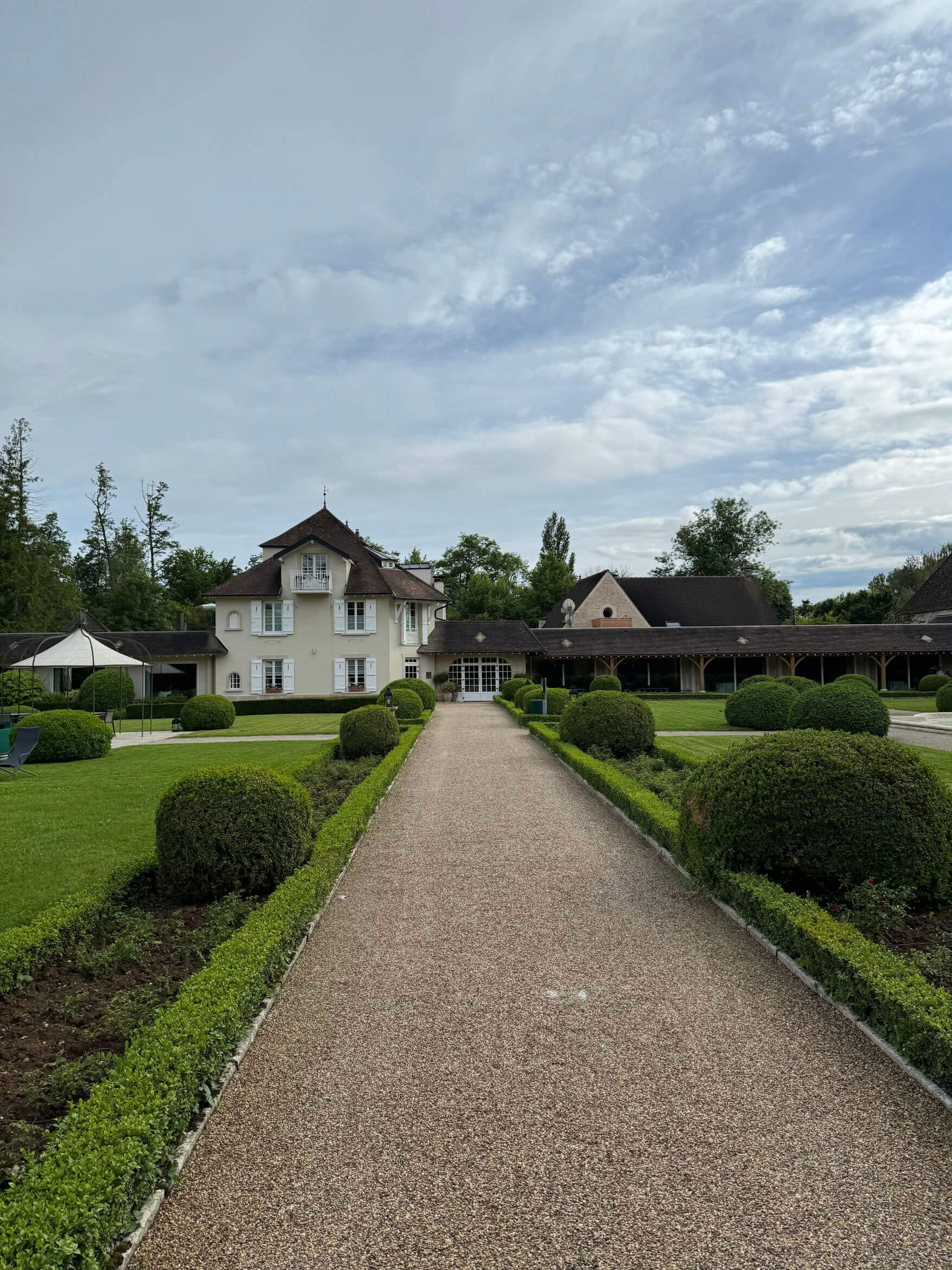 Gravel garden walk approaching Hostellerie de Levernois