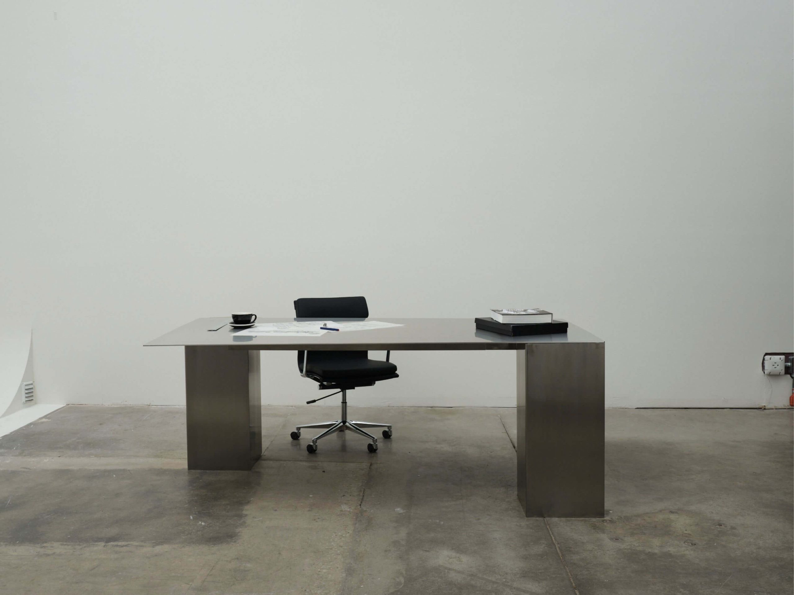 Sculptural steel sketching table