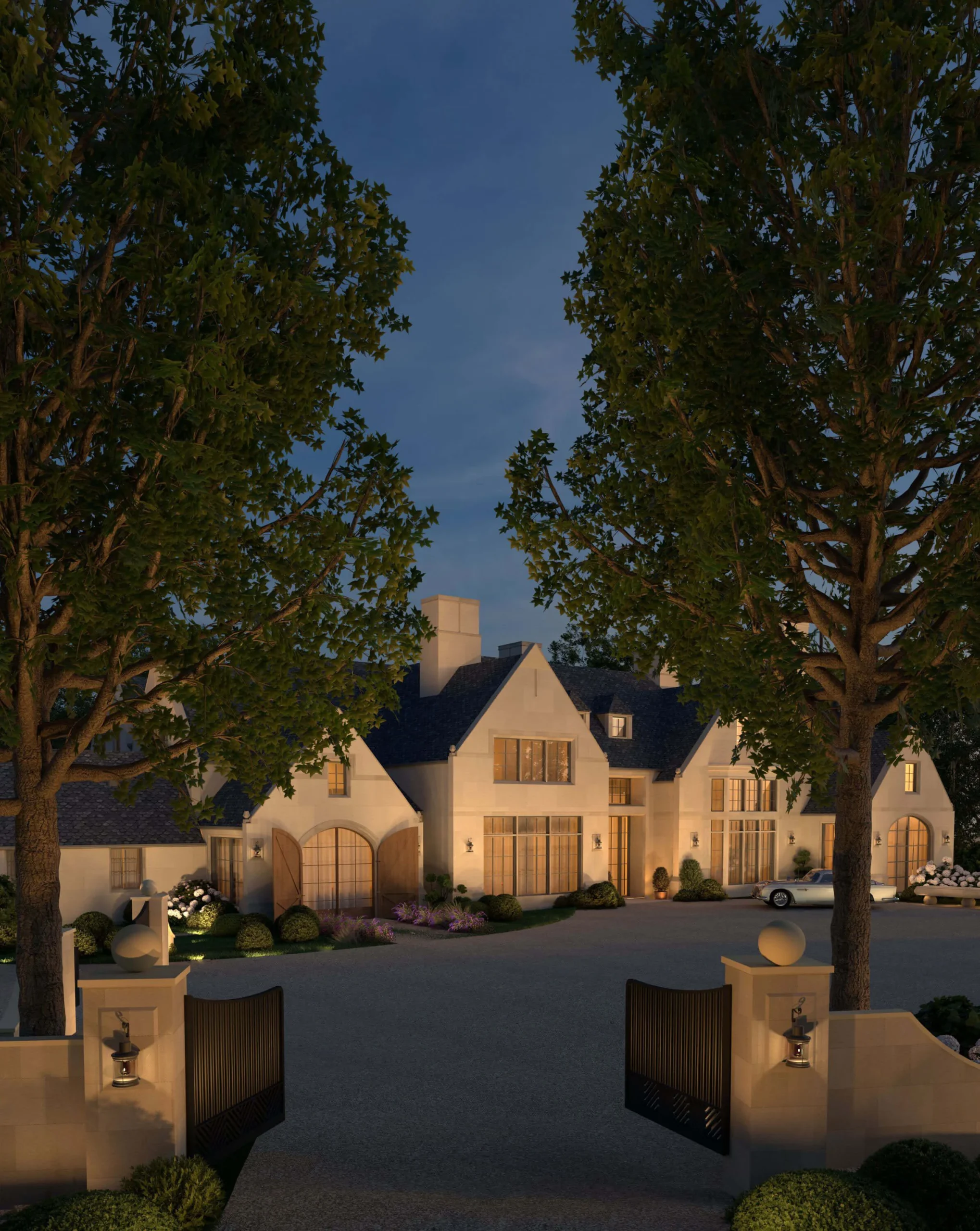 Westport Manor seen through its entrance gates at dusk