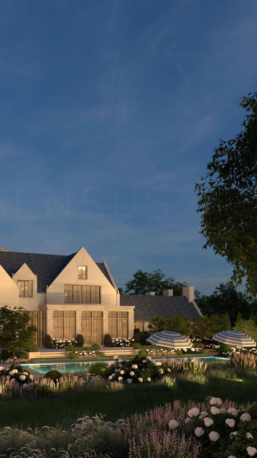 Formal gardens surrounding a stone residence
