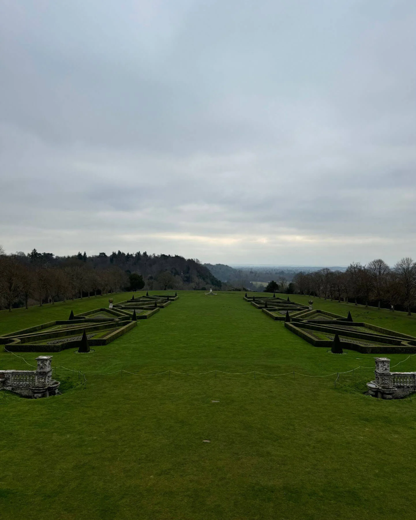 Long lawn and geometric parterres overlooking the countryside