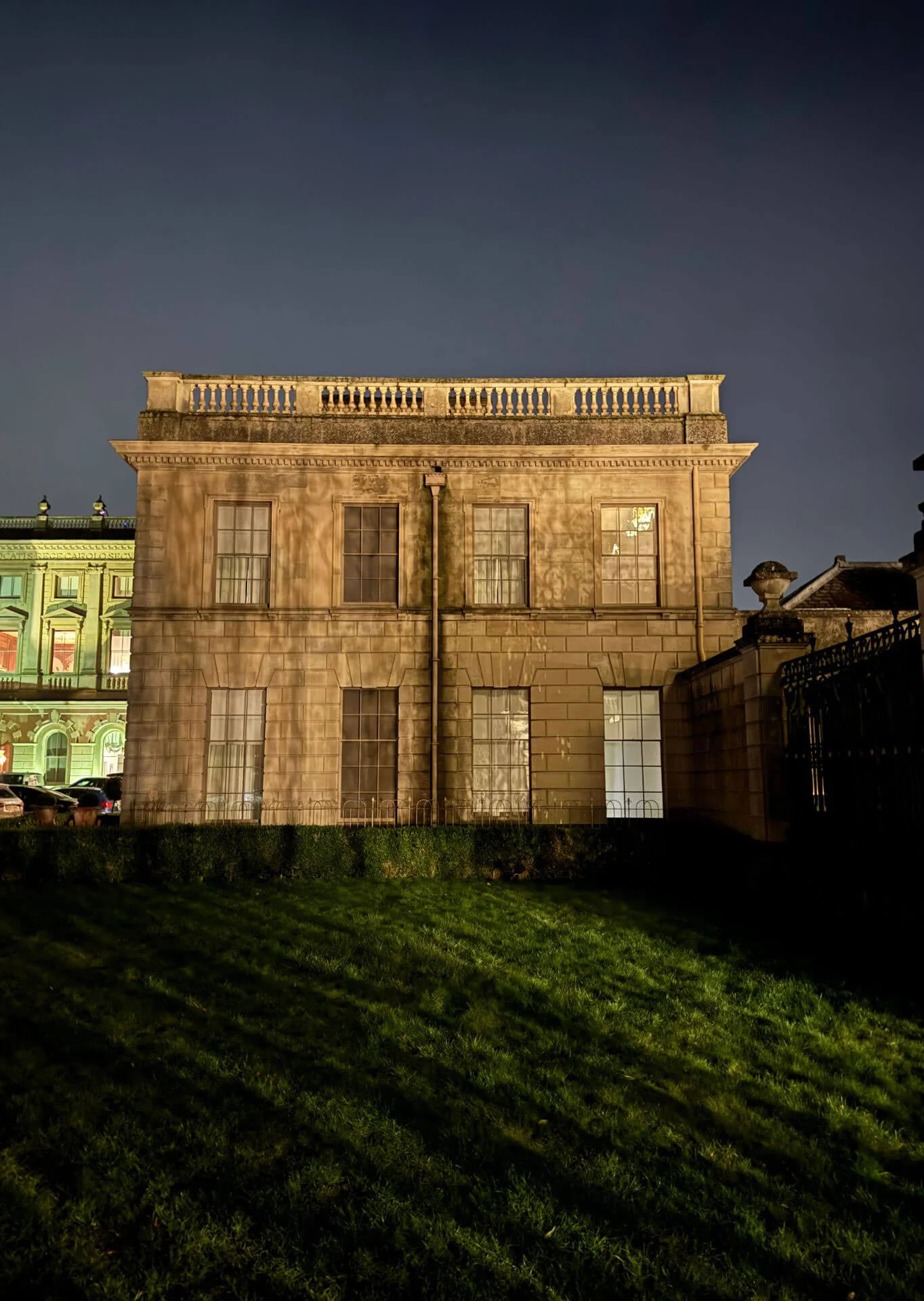 Stone pavilion illuminated after dark