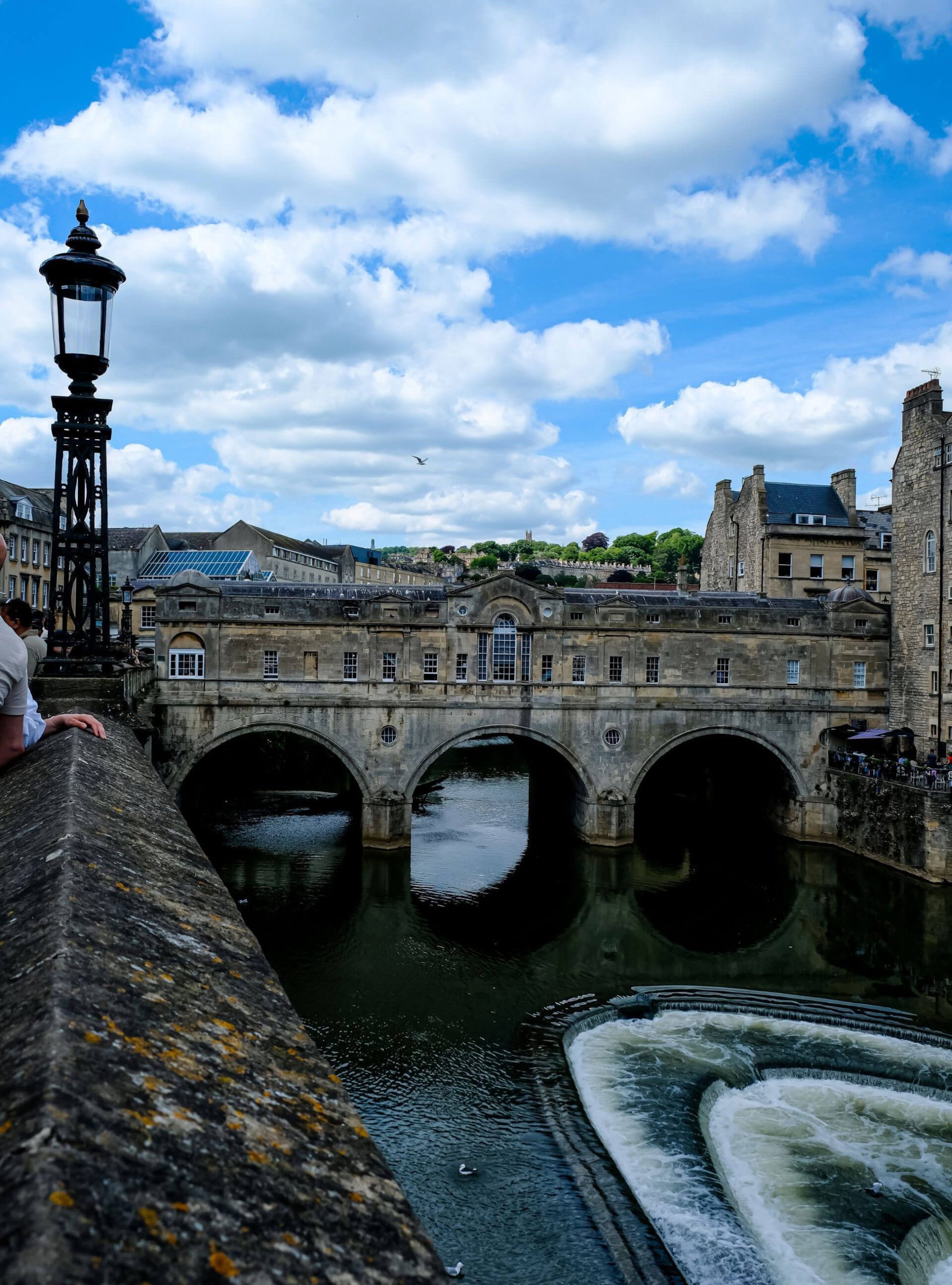 Stone bridge and river weir in Bath