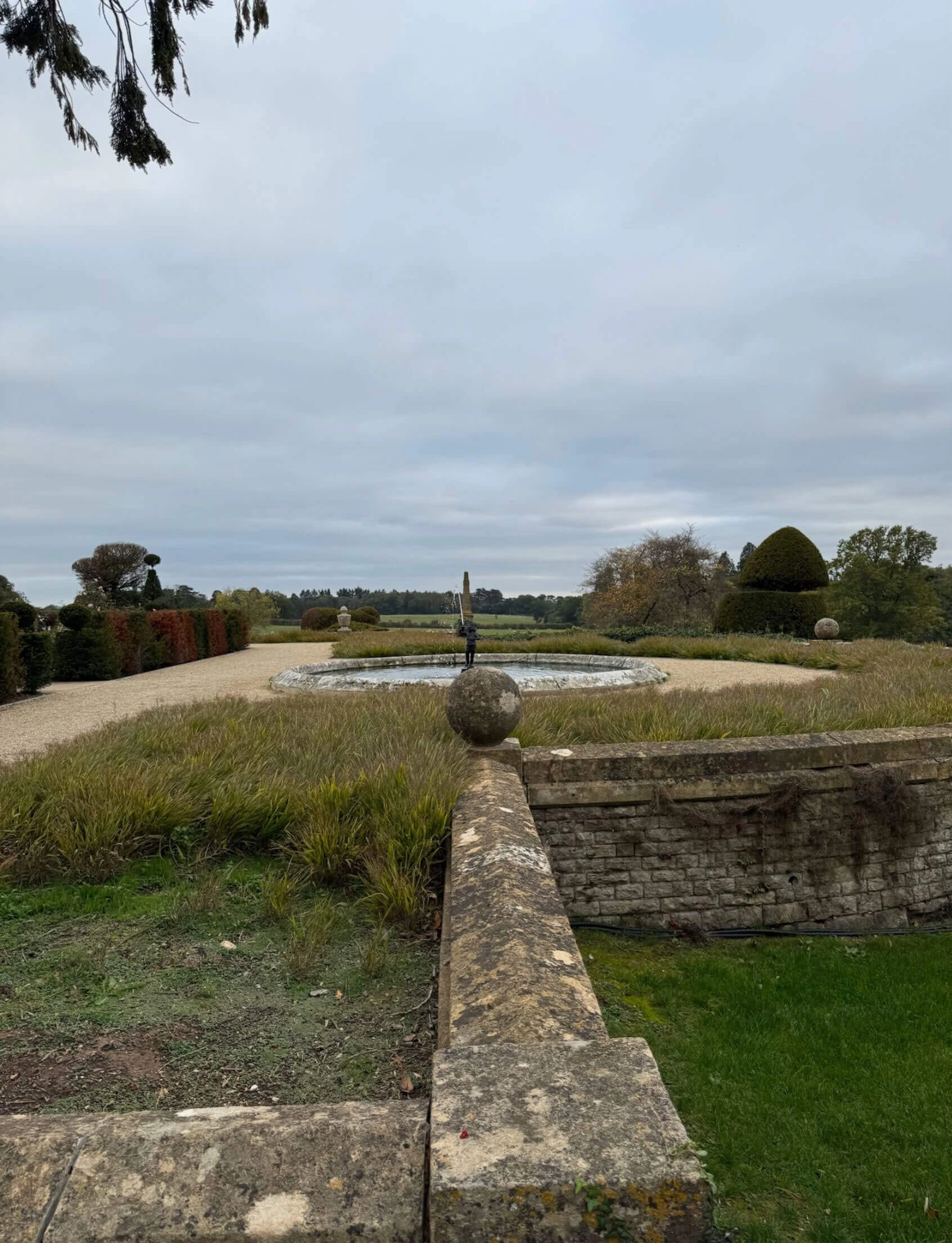Stone terrace overlooking a distant fountain