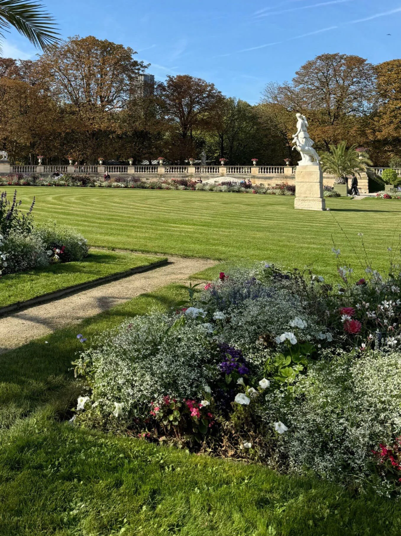 Statues around a broad formal lawn