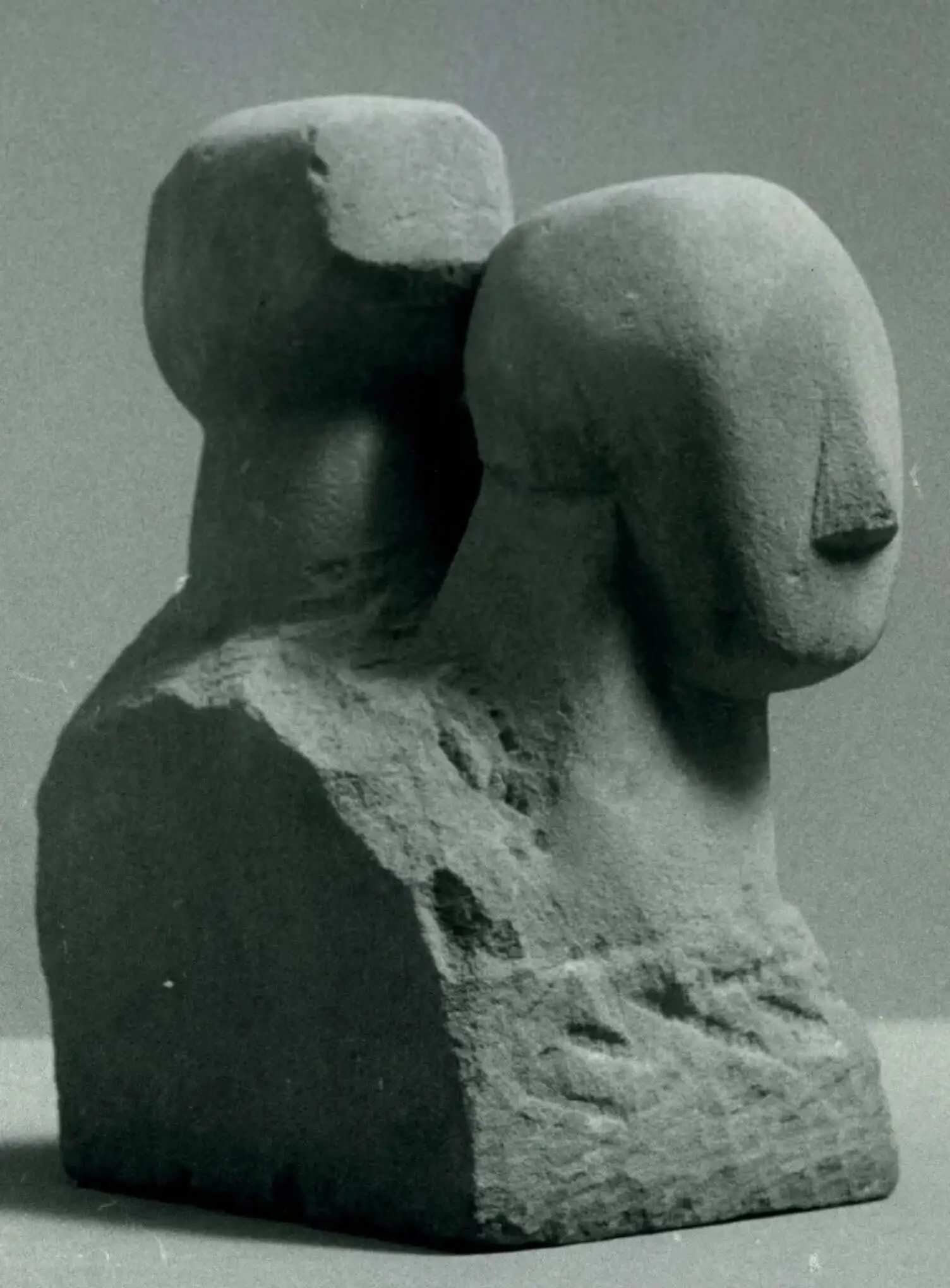 Carved stone double head sculpture