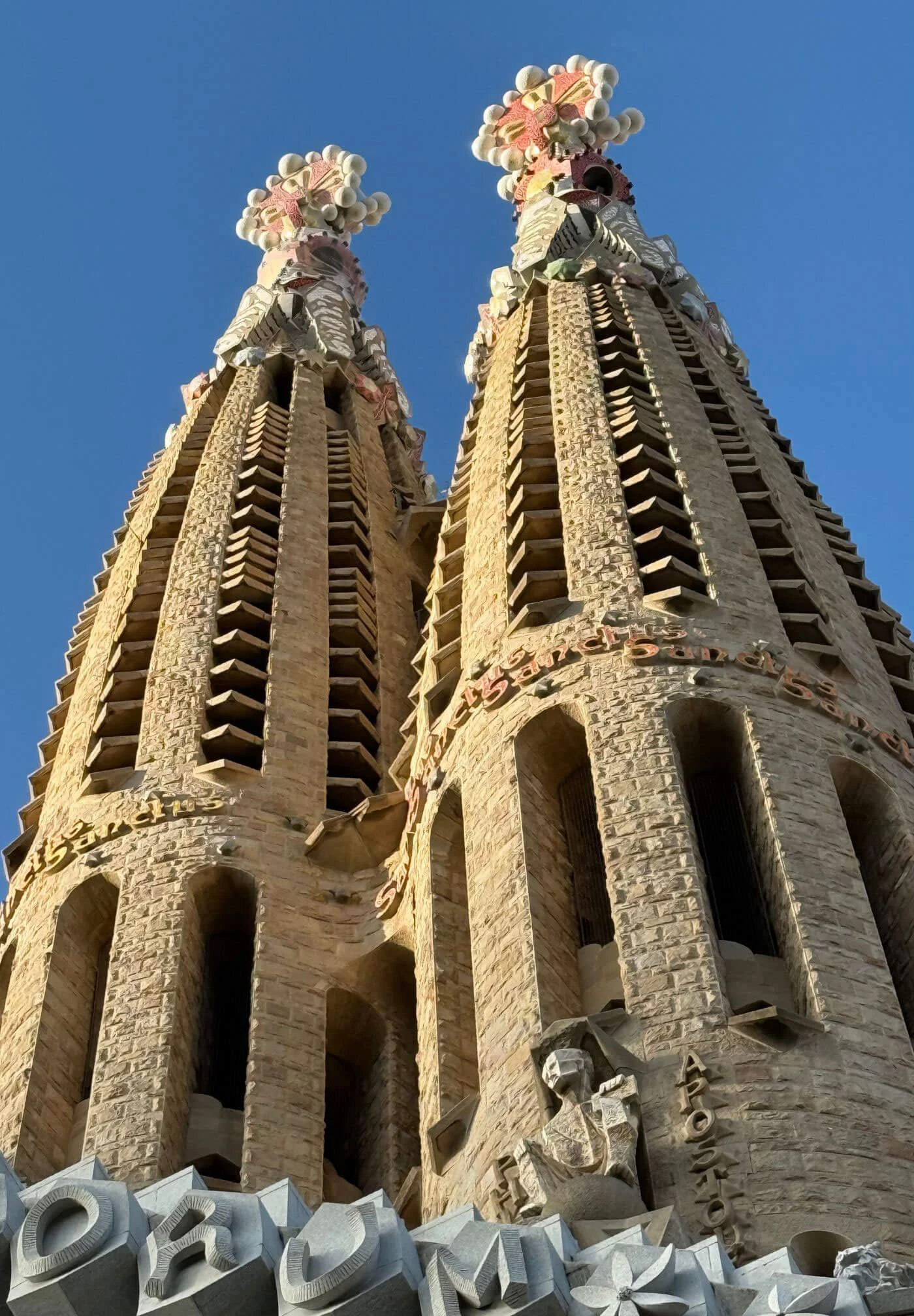 Paired stone towers with floral finials