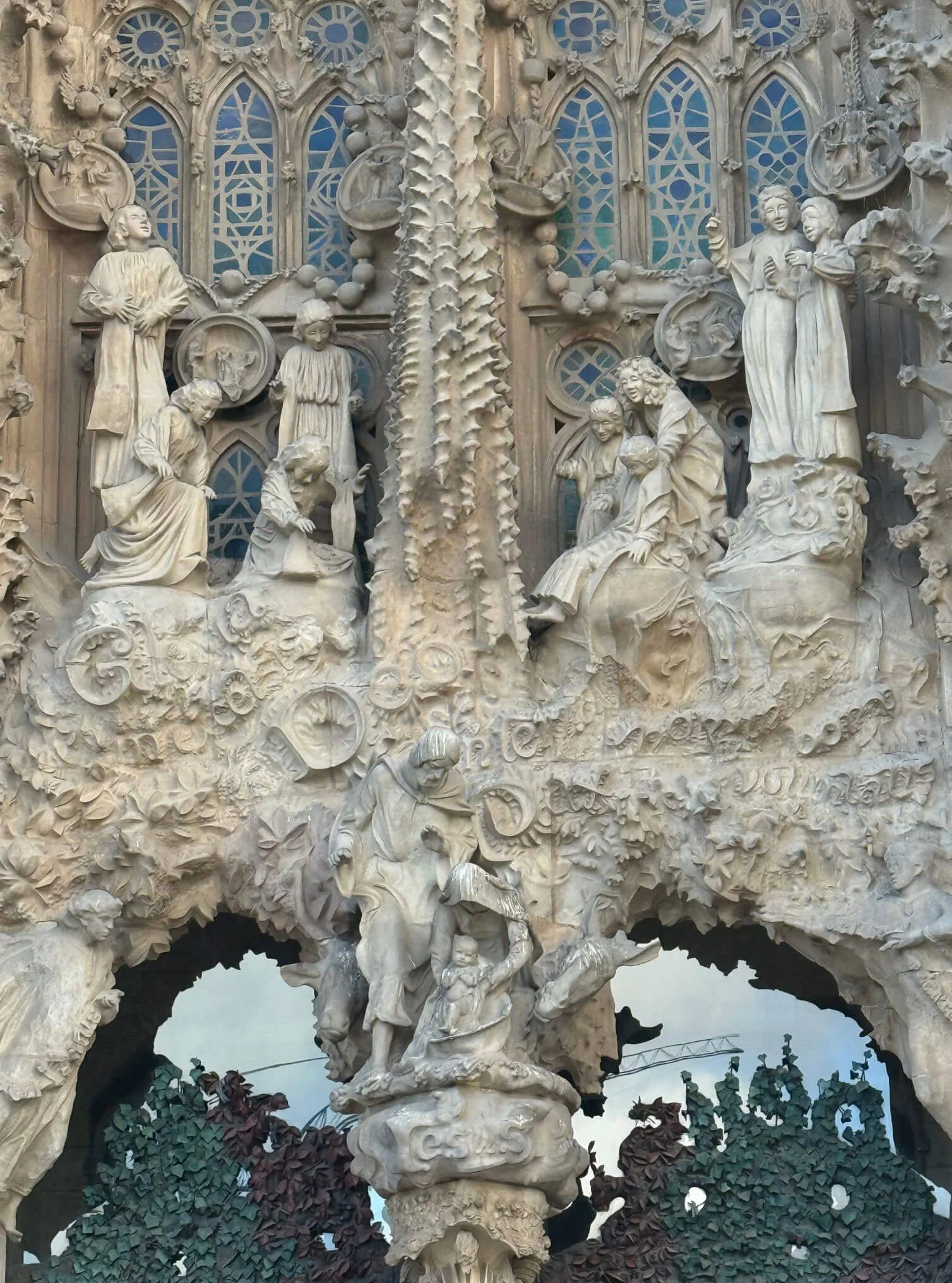 Sculpted figures and dense stone relief around an entrance