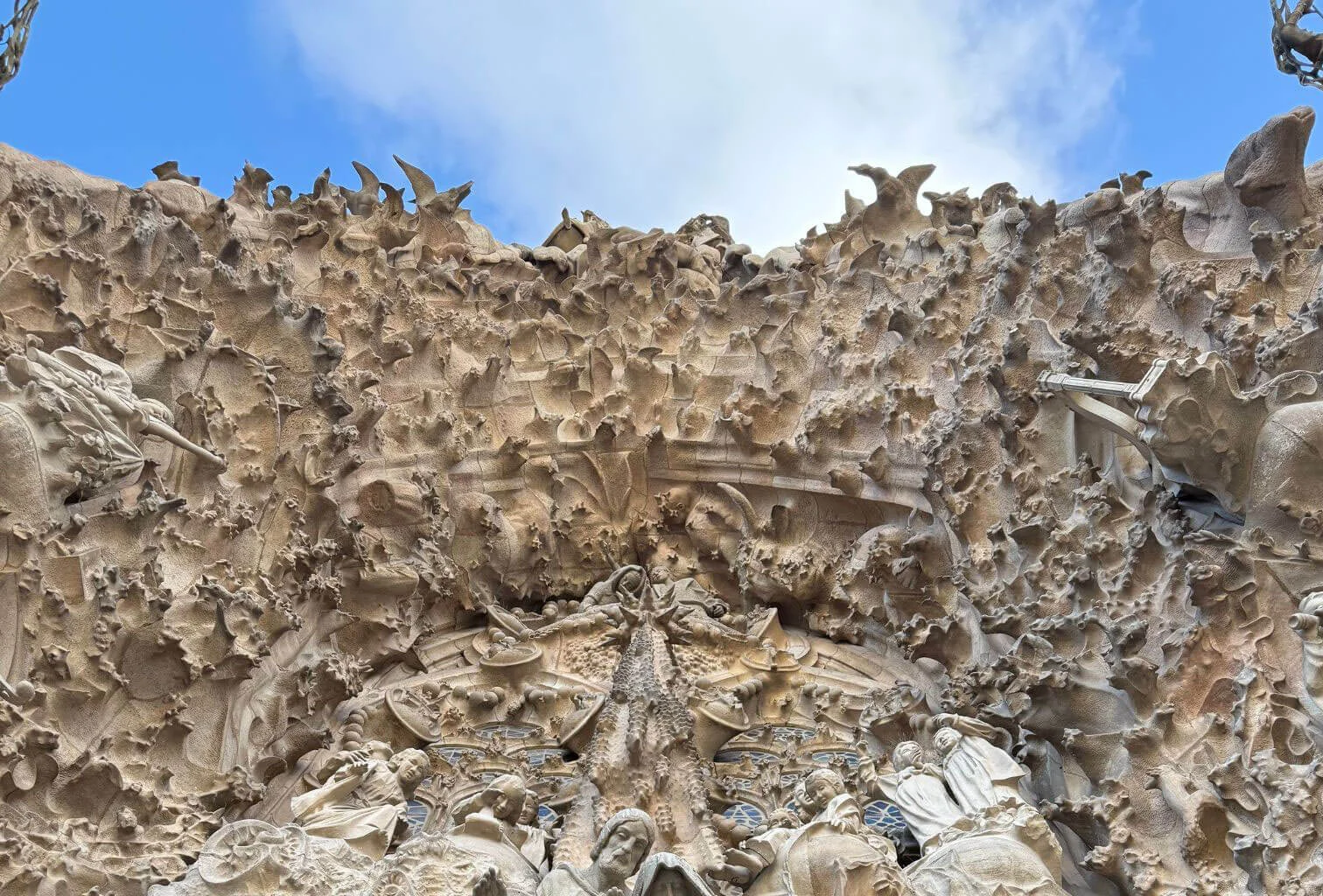 Detailed carved stone figures and foliage
