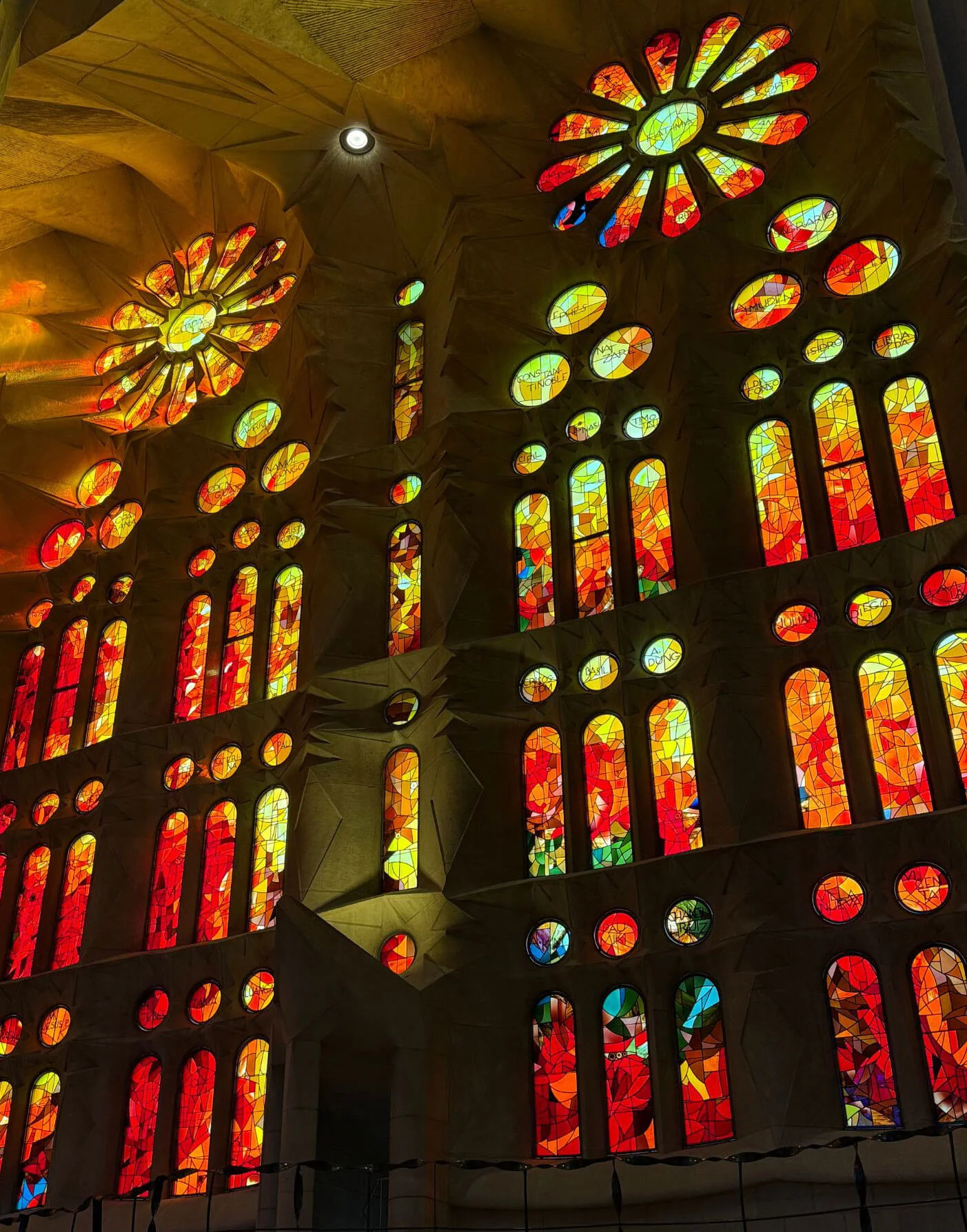 Warm red and yellow stained-glass windows