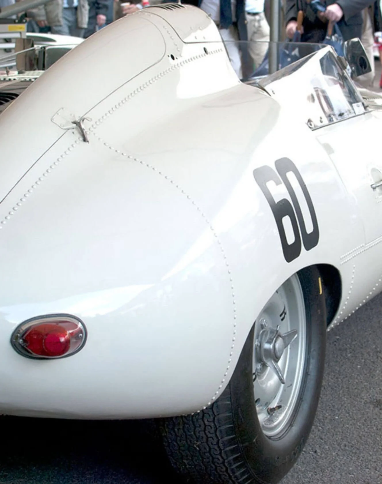 Rear bodywork and number 62 on a silver racing car