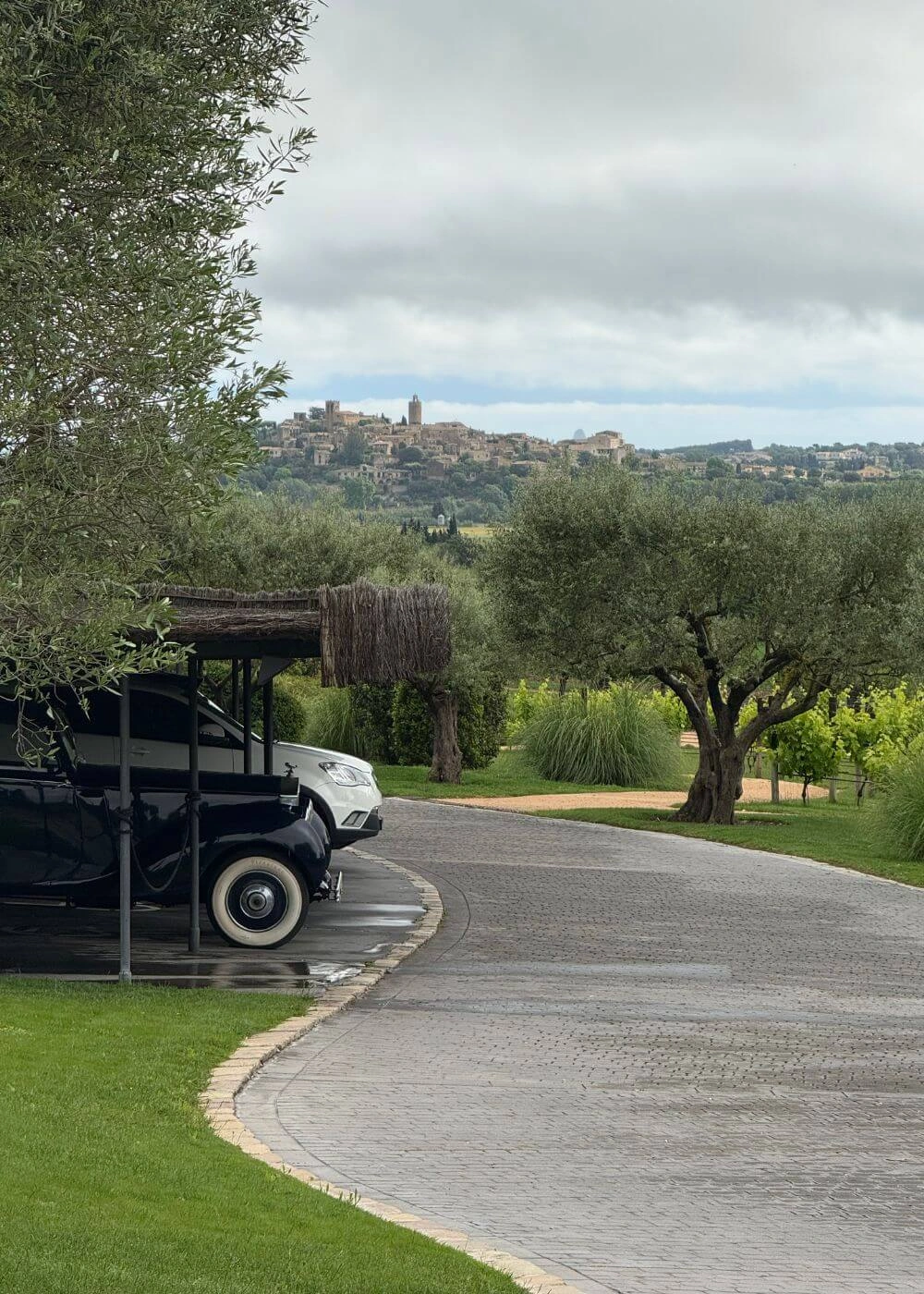 Curving drive overlooking distant countryside