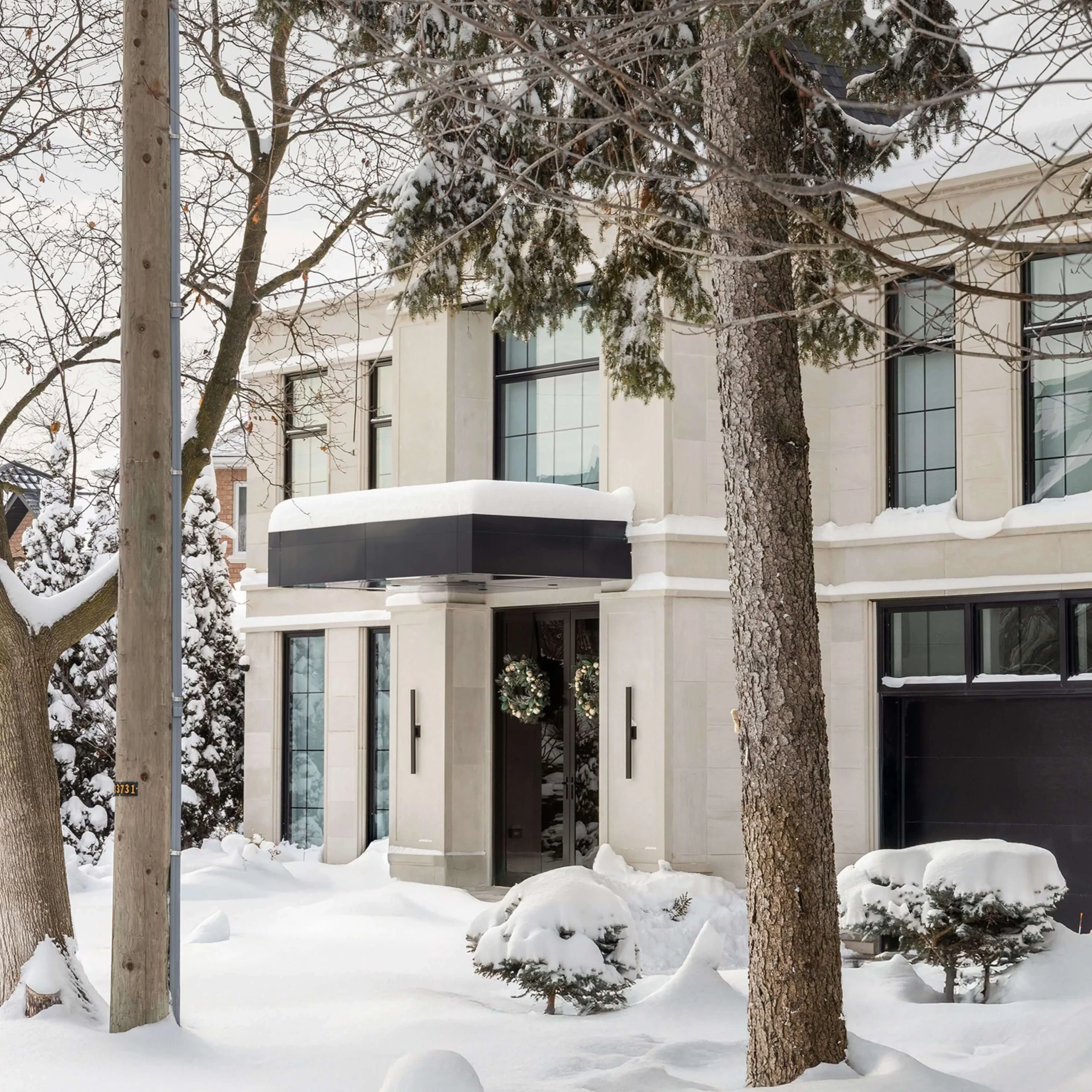 Thornhill French Chateau surrounded by snow-covered formal gardens
