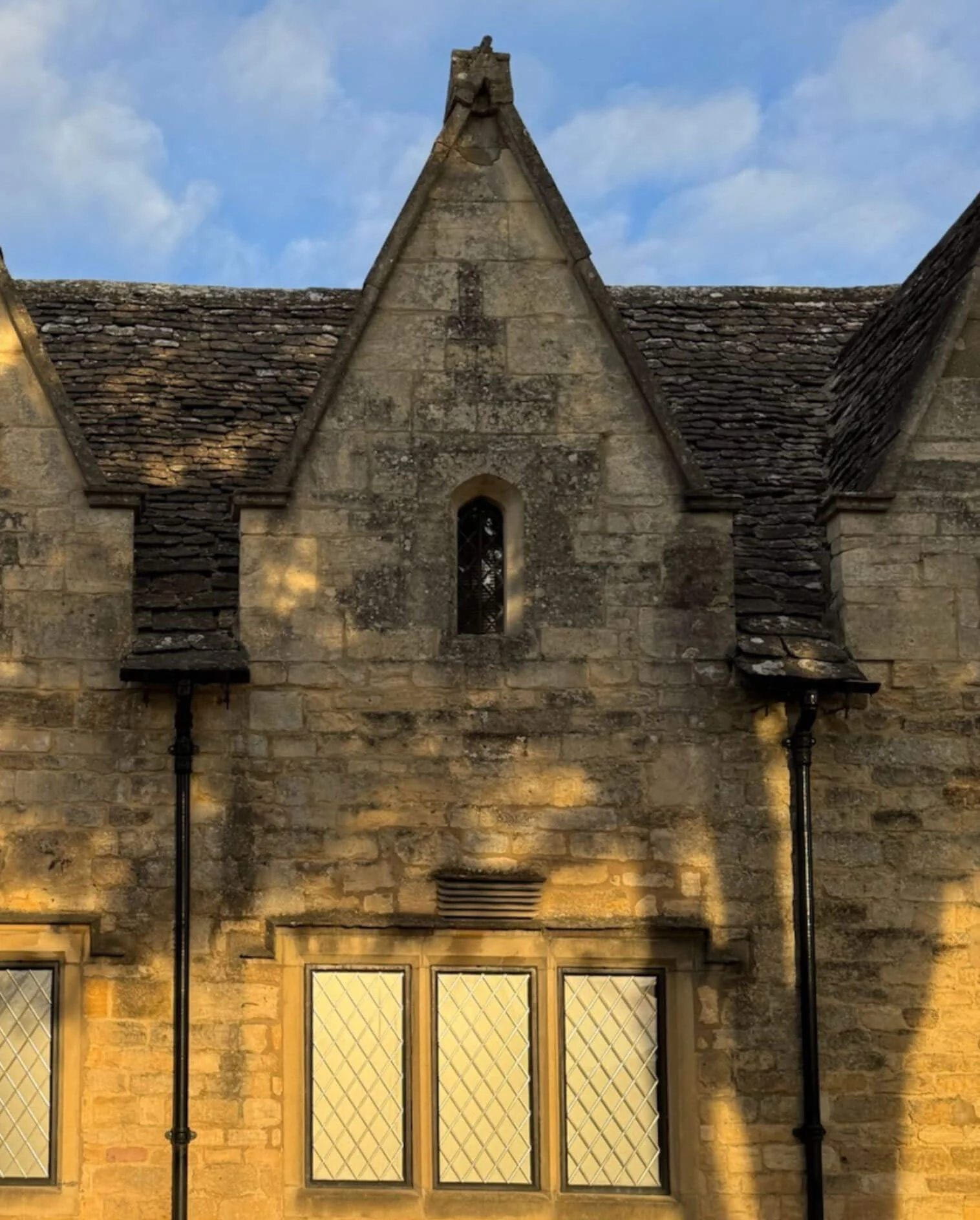 Sunlit pointed gable with a small finial