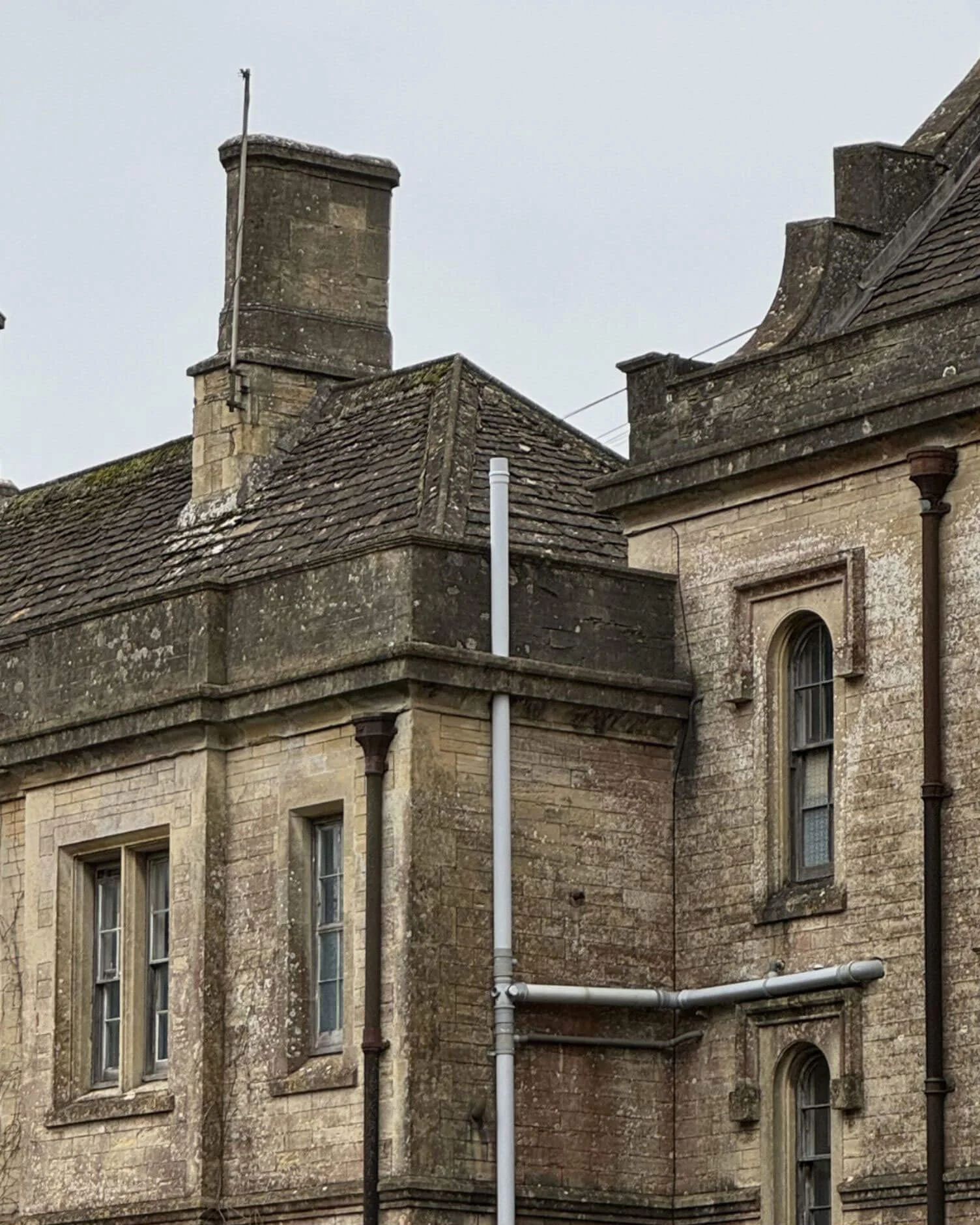 Carved stone window surrounds and drainpipes