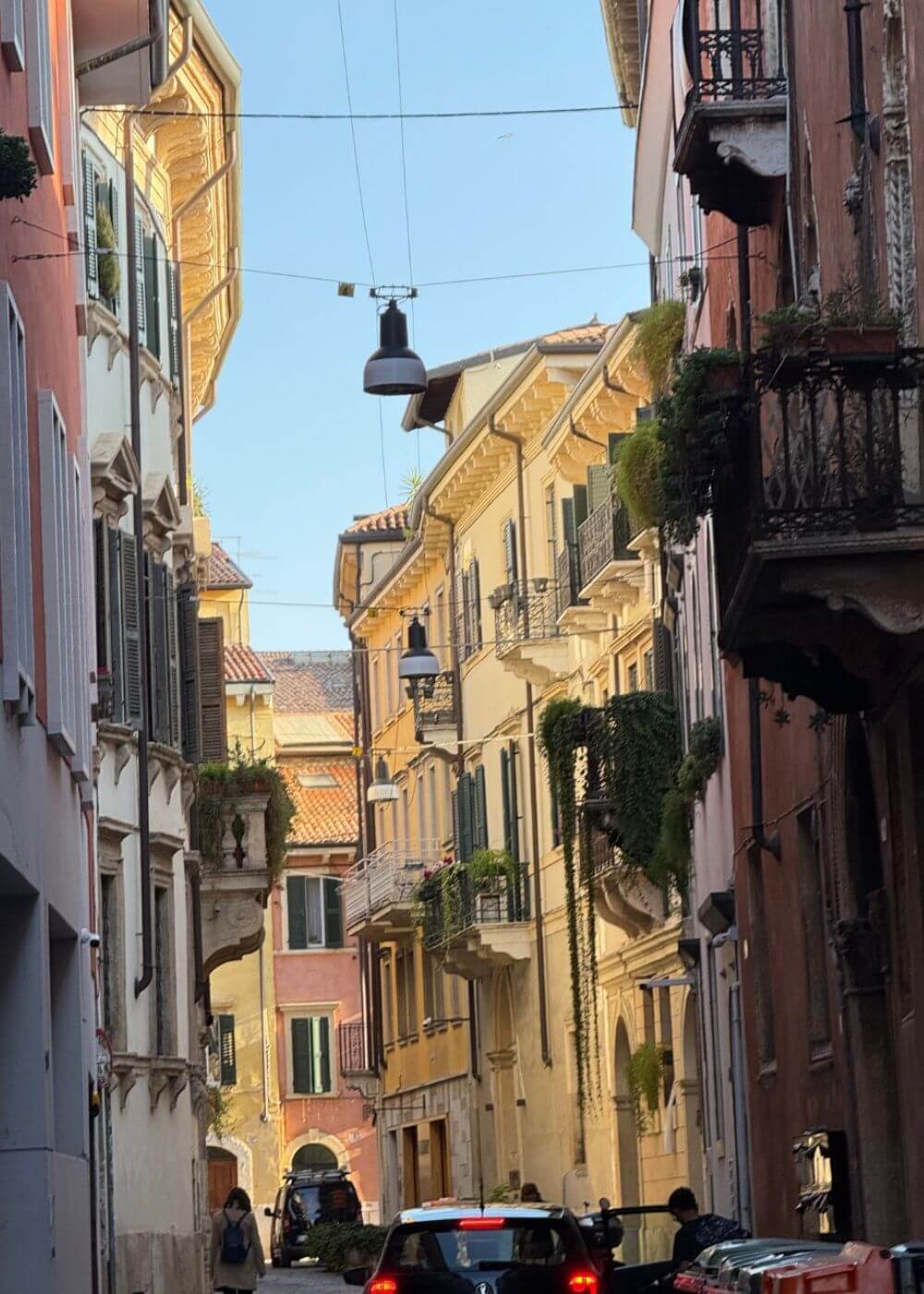 Pastel street facades and projecting balconies