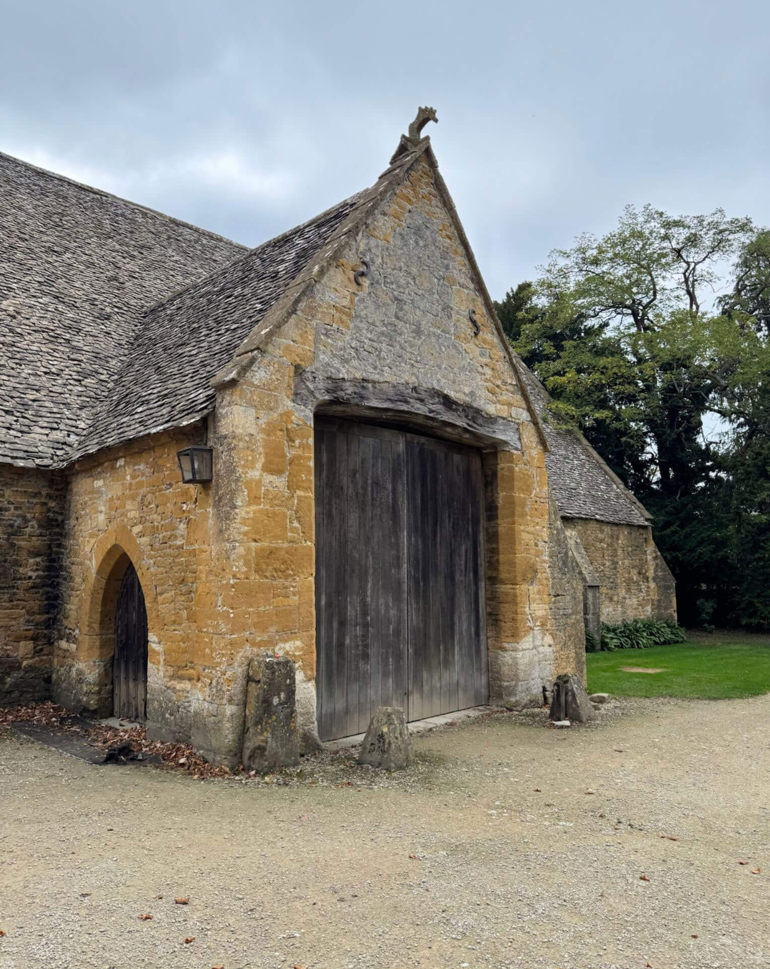 Stone outbuilding with a large timber doorway