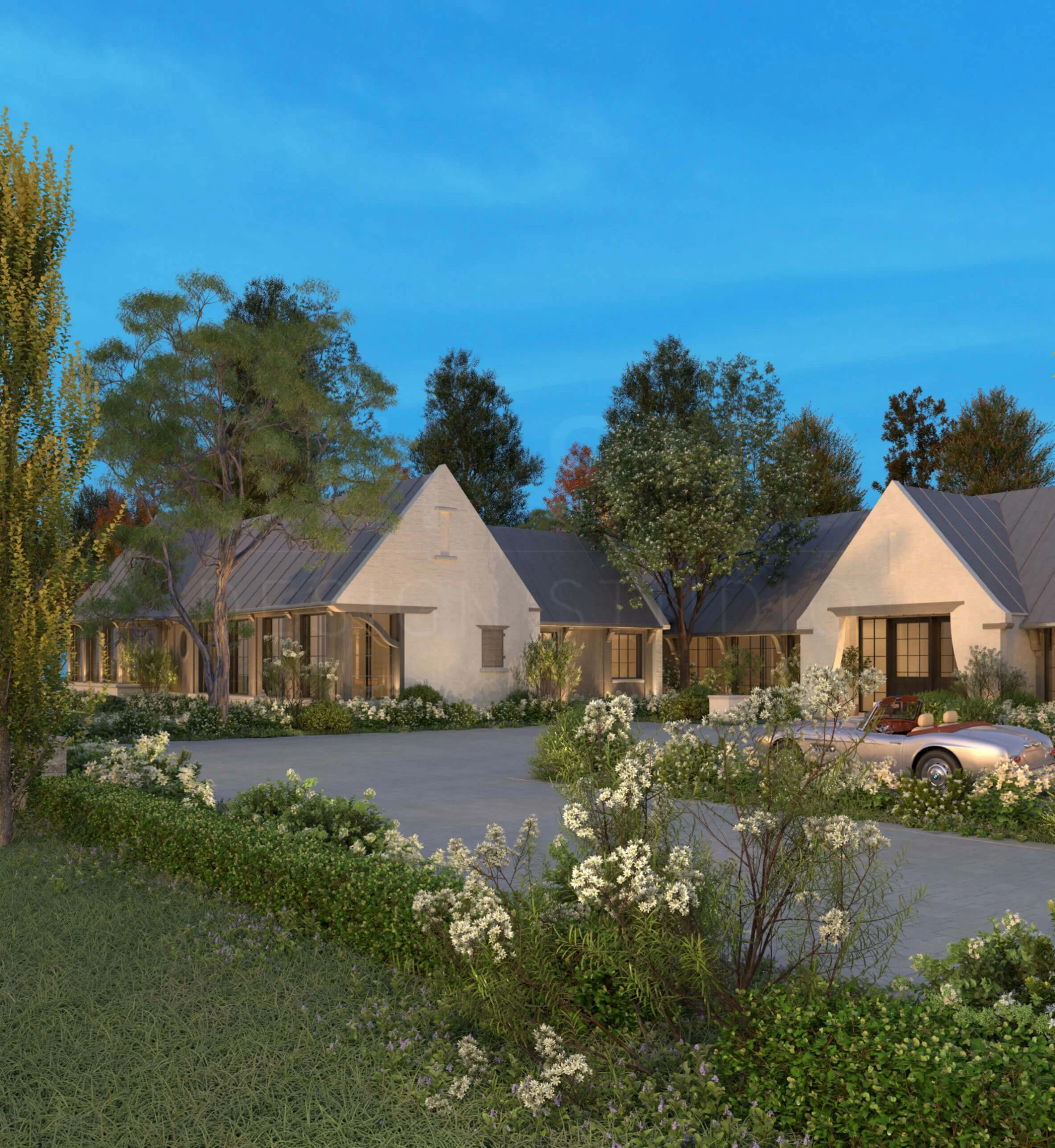 Long tree-lined drive arriving at the front courtyard