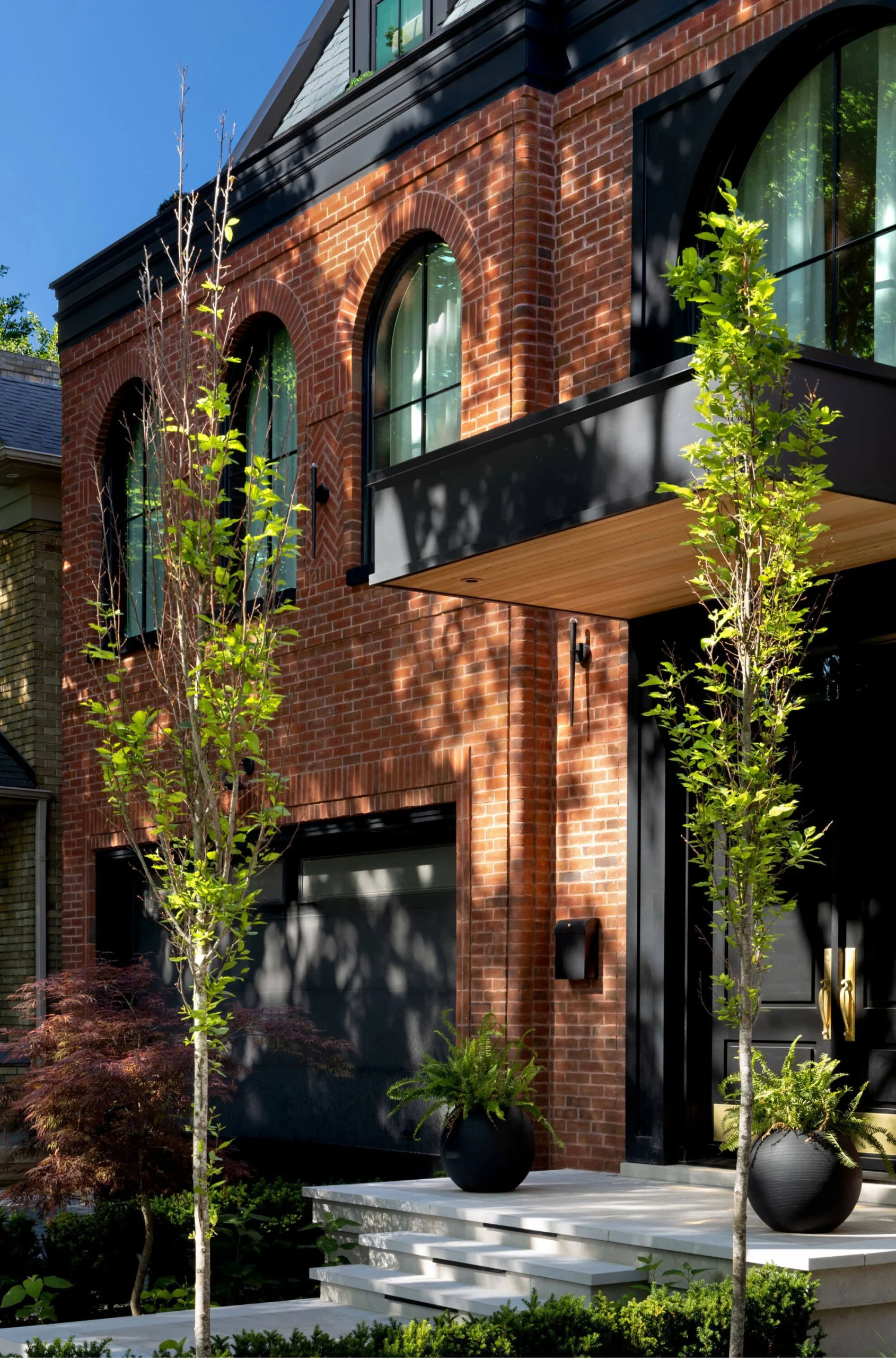 Red-brick facade of the Bloor West Brownstone